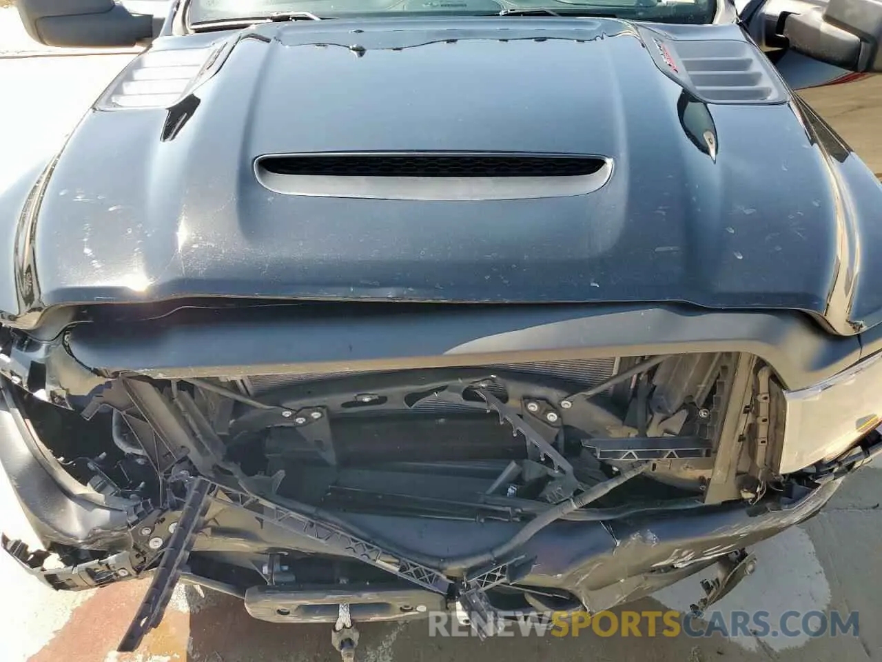 11 Photograph of a damaged car 3C6TR5EJXPG569677 RAM 2500 2023