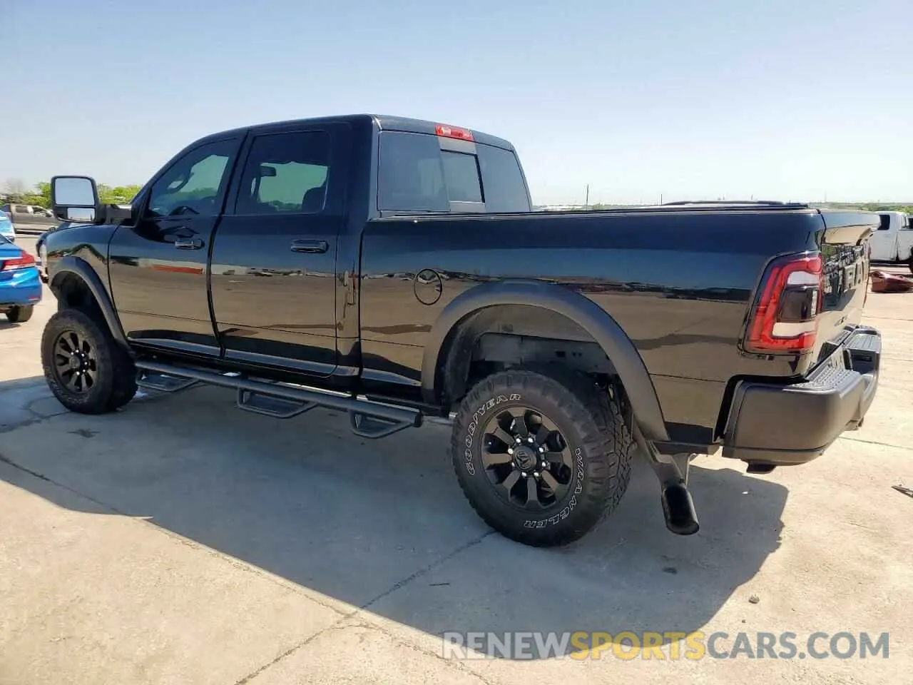 2 Photograph of a damaged car 3C6TR5EJXPG569677 RAM 2500 2023
