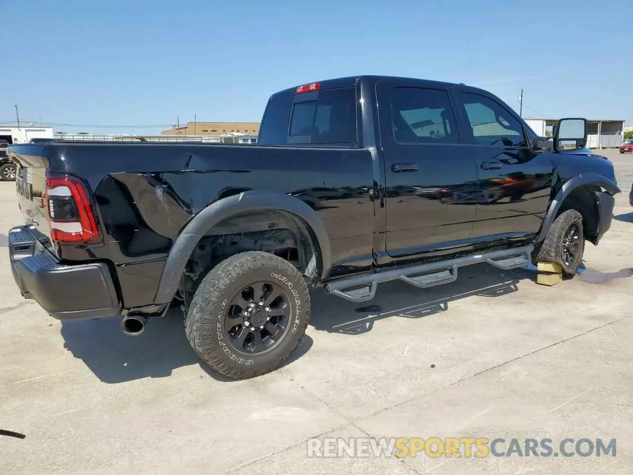 3 Photograph of a damaged car 3C6TR5EJXPG569677 RAM 2500 2023