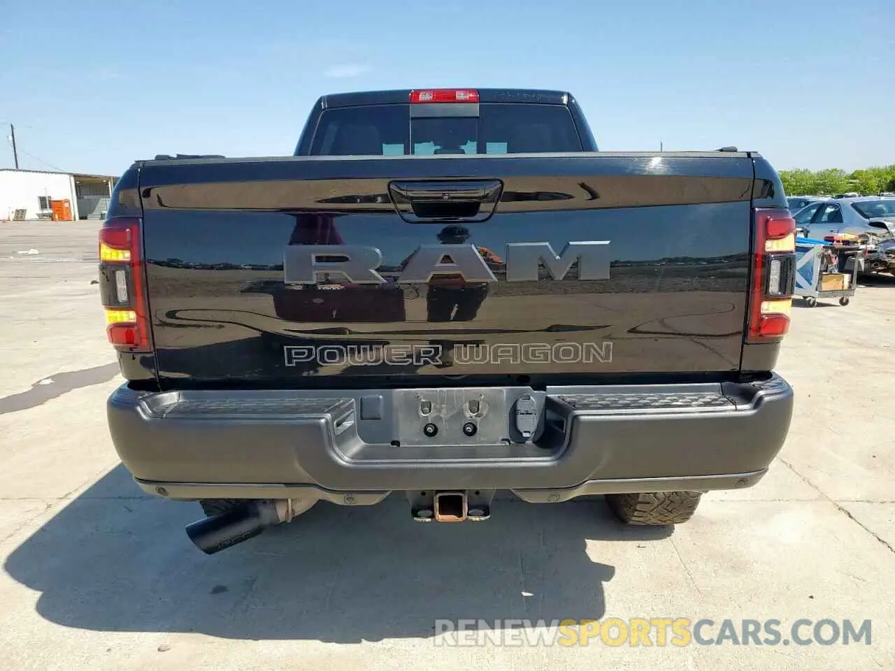 6 Photograph of a damaged car 3C6TR5EJXPG569677 RAM 2500 2023