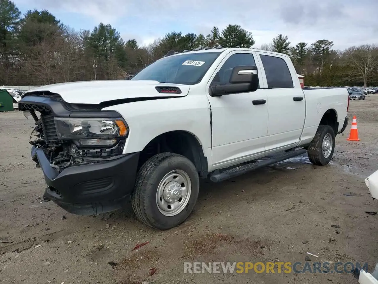 1 Photograph of a damaged car 3C6UR5CJ0PG528885 RAM 2500 2023