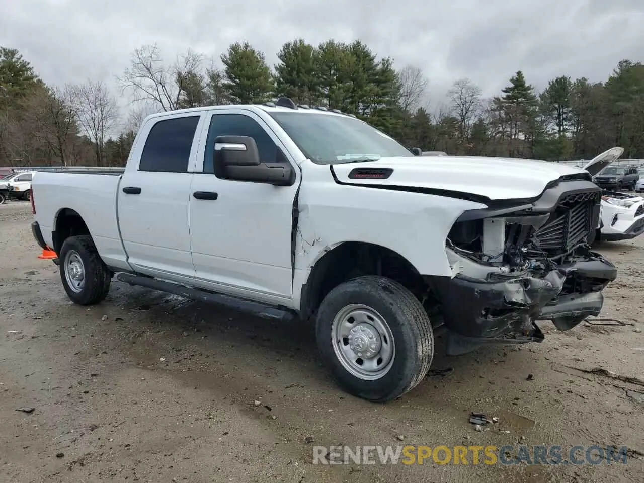 4 Photograph of a damaged car 3C6UR5CJ0PG528885 RAM 2500 2023
