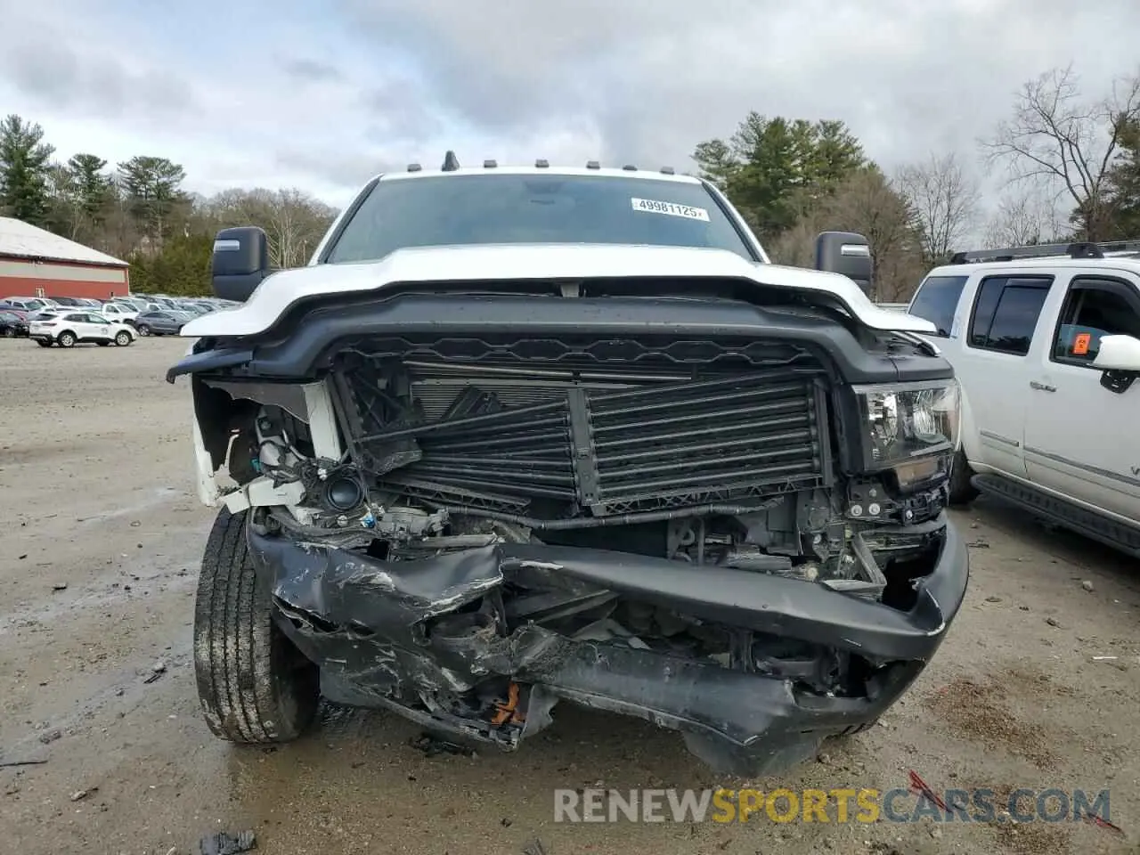 5 Photograph of a damaged car 3C6UR5CJ0PG528885 RAM 2500 2023
