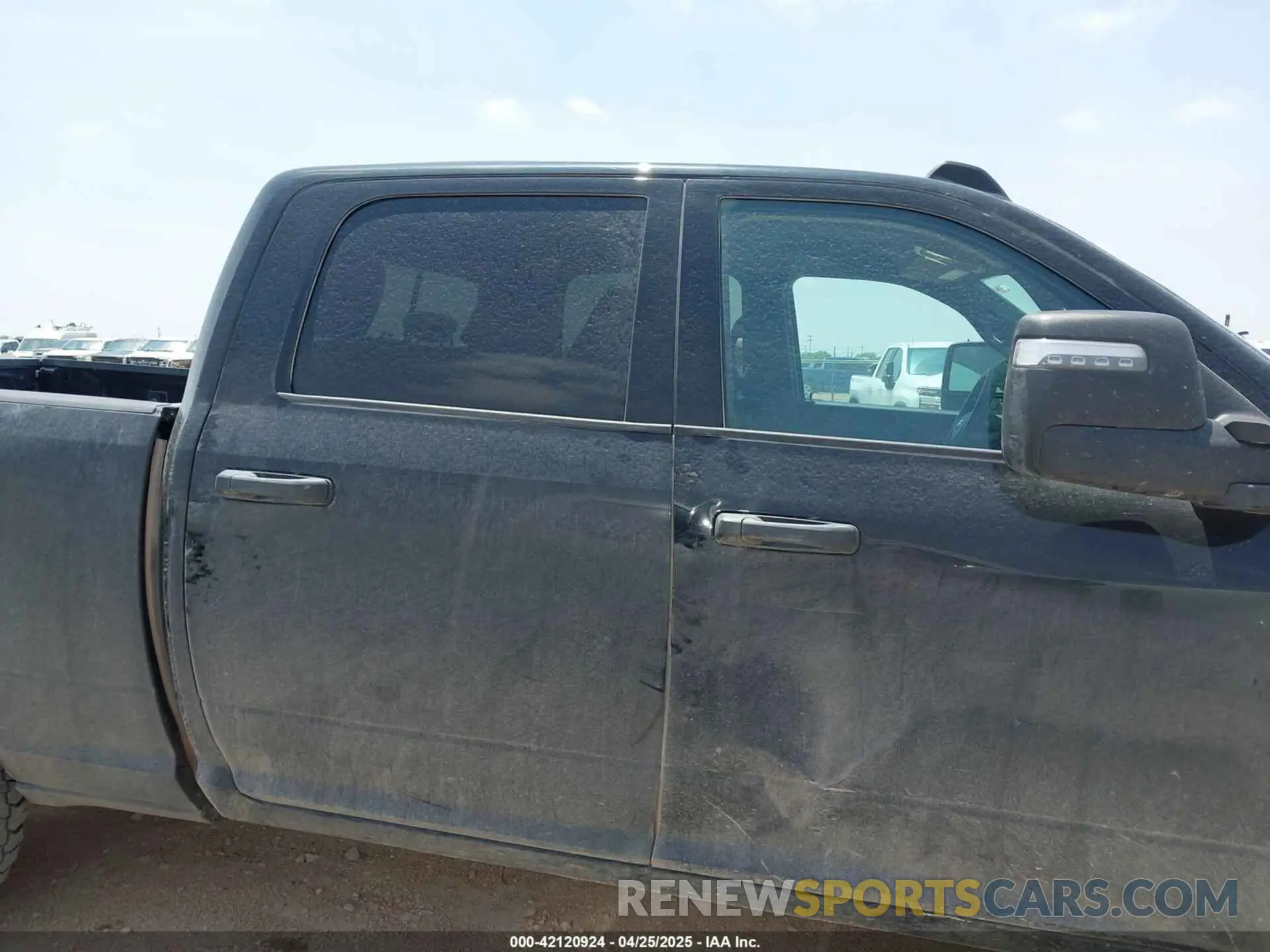 13 Photograph of a damaged car 3C6UR5CJ2PG532744 RAM 2500 2023