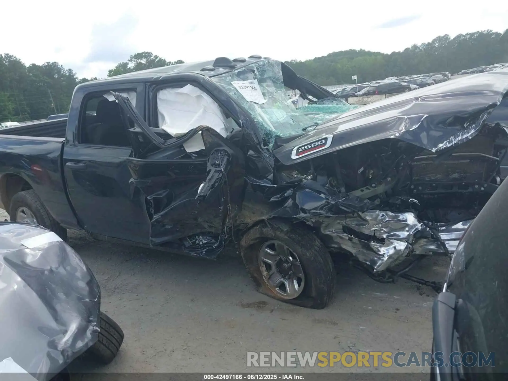 1 Photograph of a damaged car 3C6UR5CJ4PG503729 RAM 2500 2023