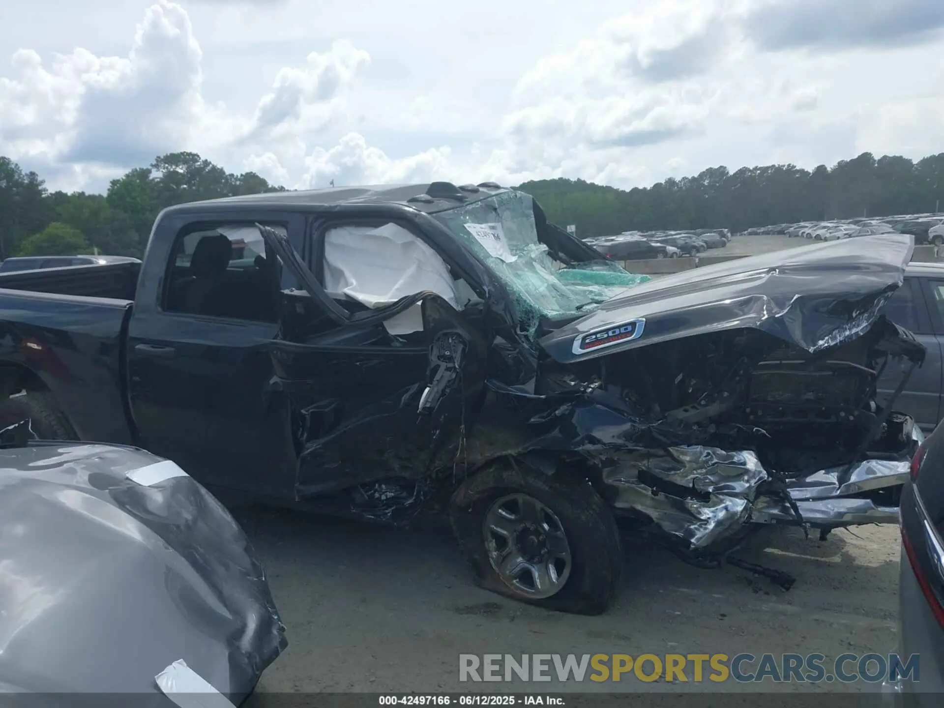 12 Photograph of a damaged car 3C6UR5CJ4PG503729 RAM 2500 2023