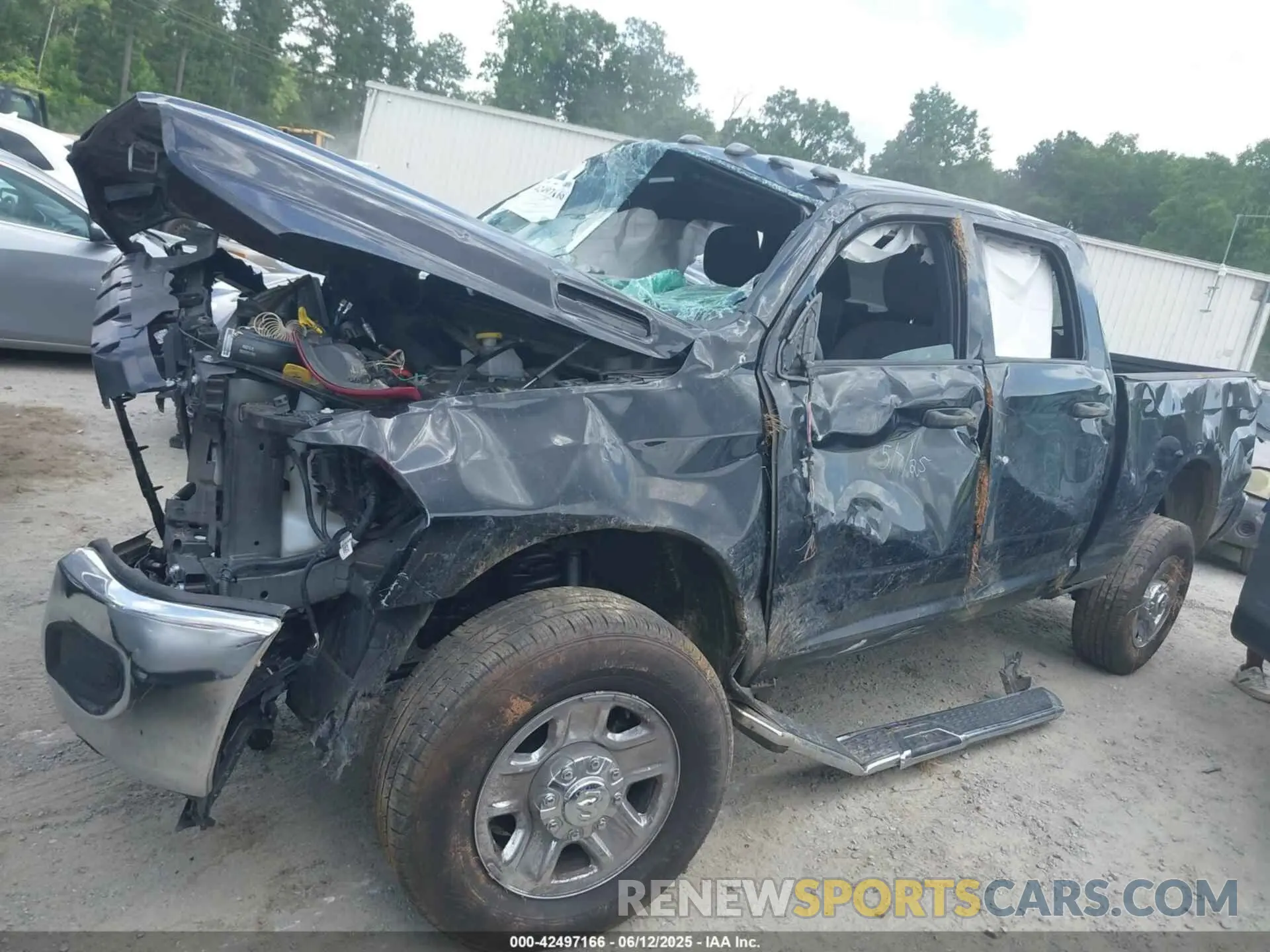 13 Photograph of a damaged car 3C6UR5CJ4PG503729 RAM 2500 2023
