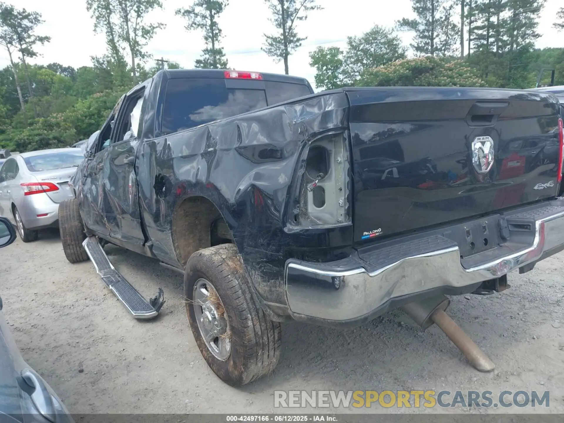 3 Photograph of a damaged car 3C6UR5CJ4PG503729 RAM 2500 2023