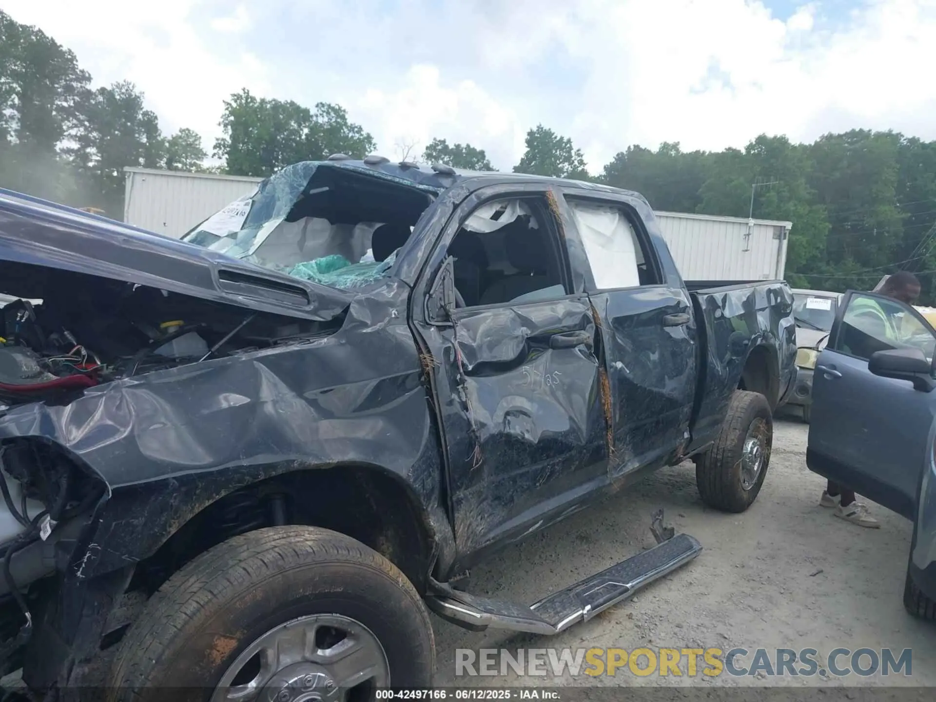 6 Photograph of a damaged car 3C6UR5CJ4PG503729 RAM 2500 2023