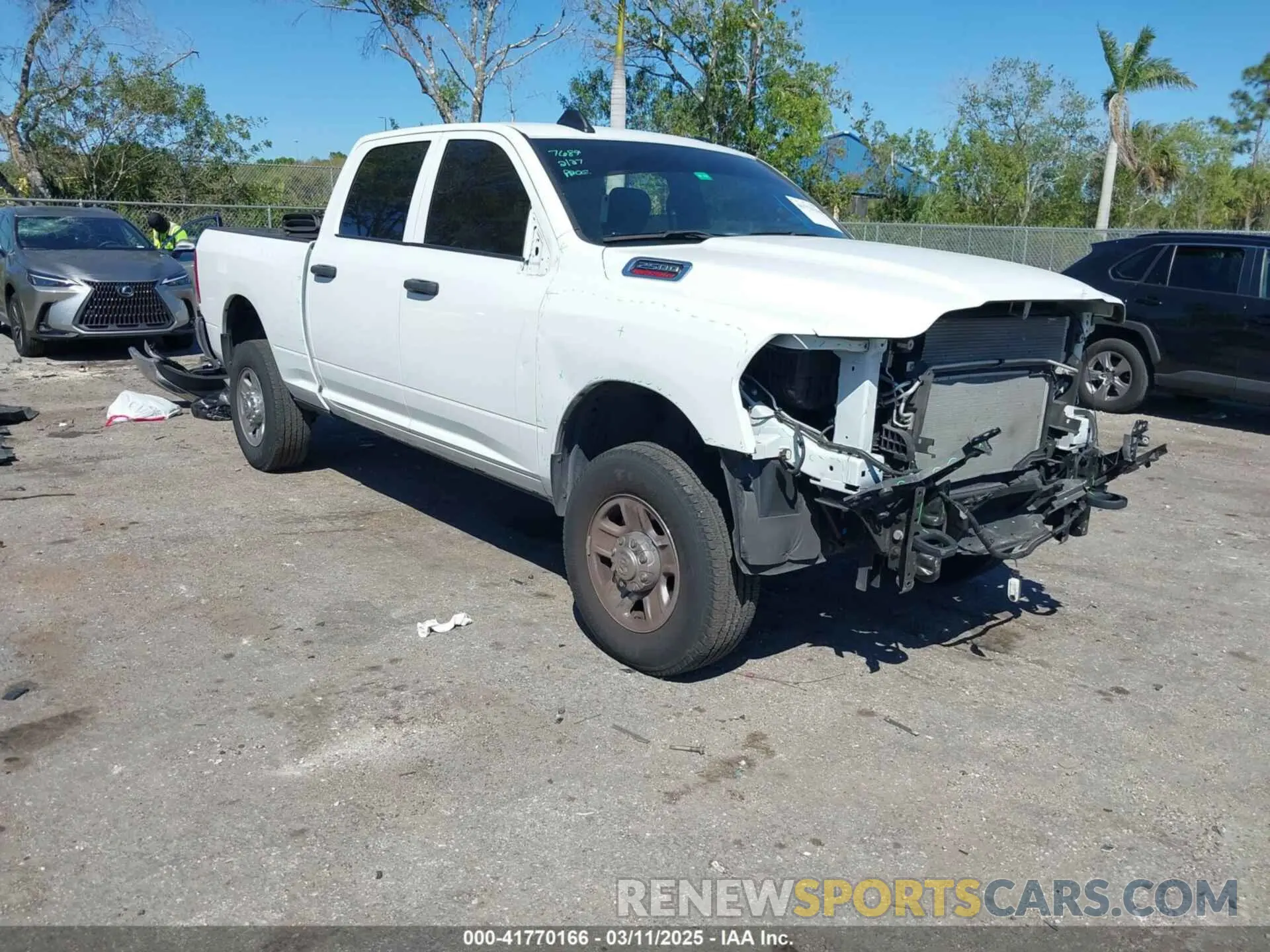 1 Photograph of a damaged car 3C6UR5CJ6PG517275 RAM 2500 2023