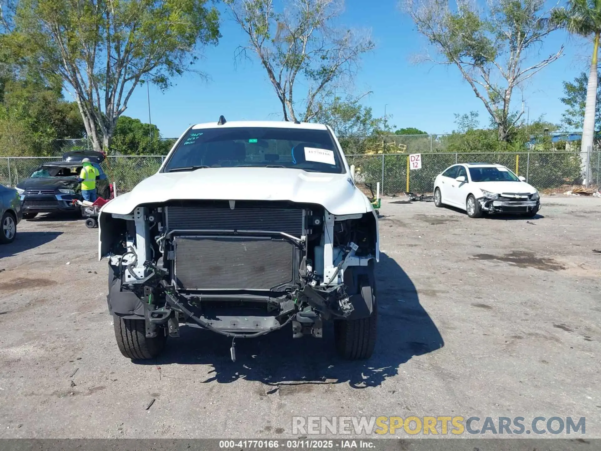 13 Photograph of a damaged car 3C6UR5CJ6PG517275 RAM 2500 2023