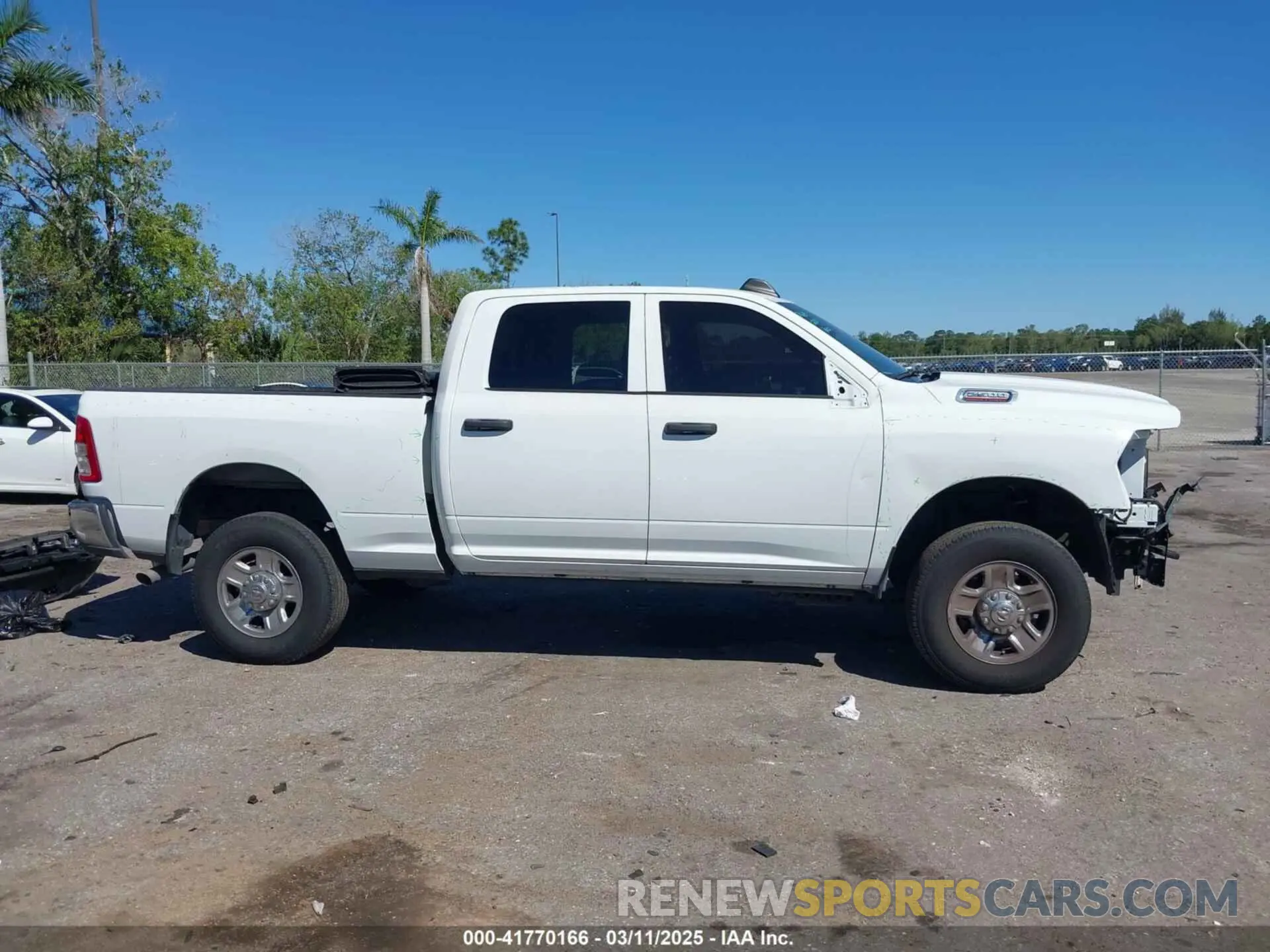 14 Photograph of a damaged car 3C6UR5CJ6PG517275 RAM 2500 2023