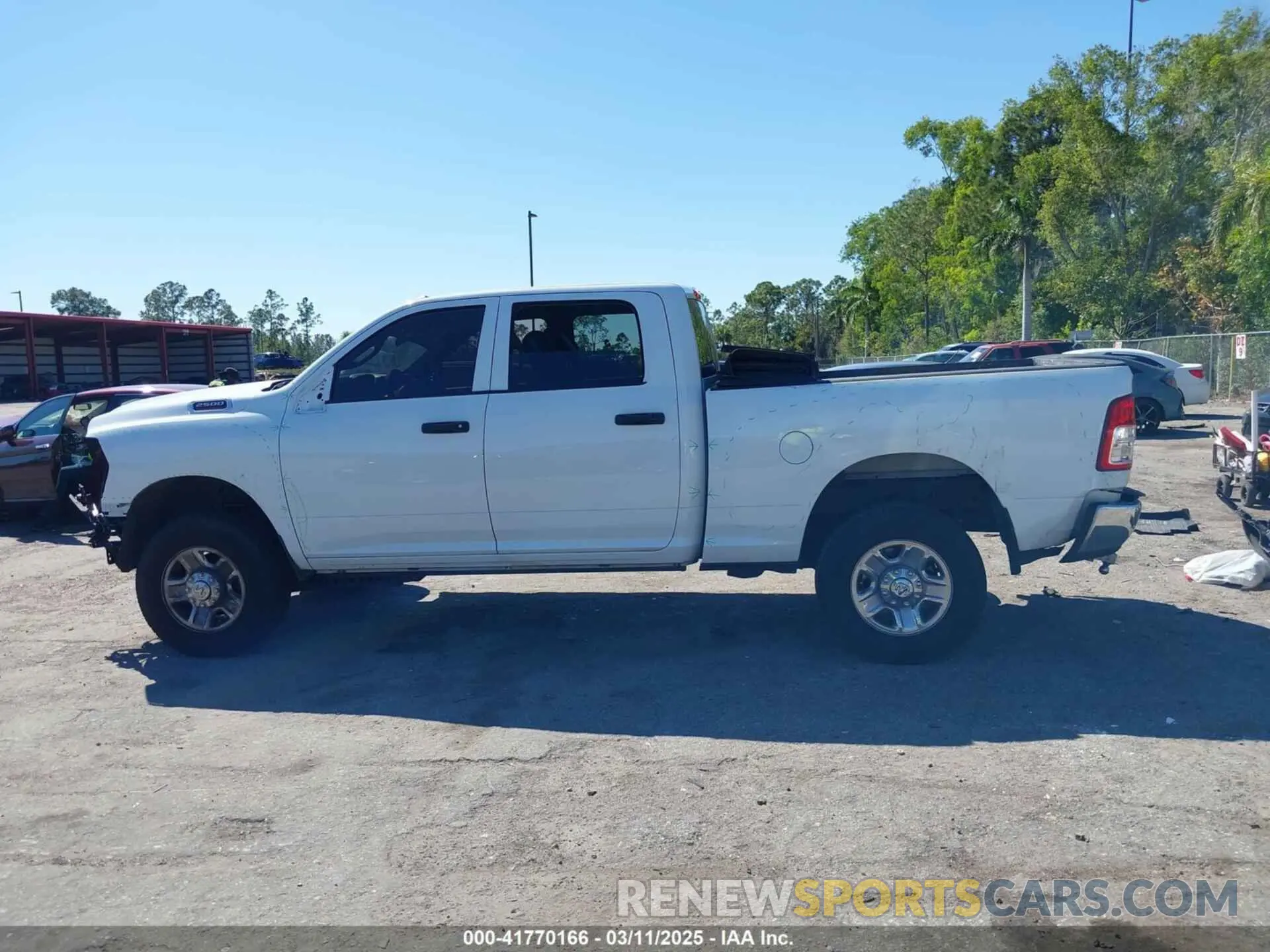15 Photograph of a damaged car 3C6UR5CJ6PG517275 RAM 2500 2023