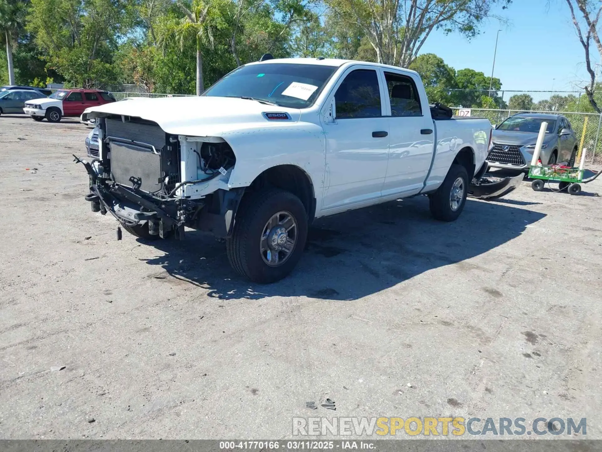 2 Photograph of a damaged car 3C6UR5CJ6PG517275 RAM 2500 2023