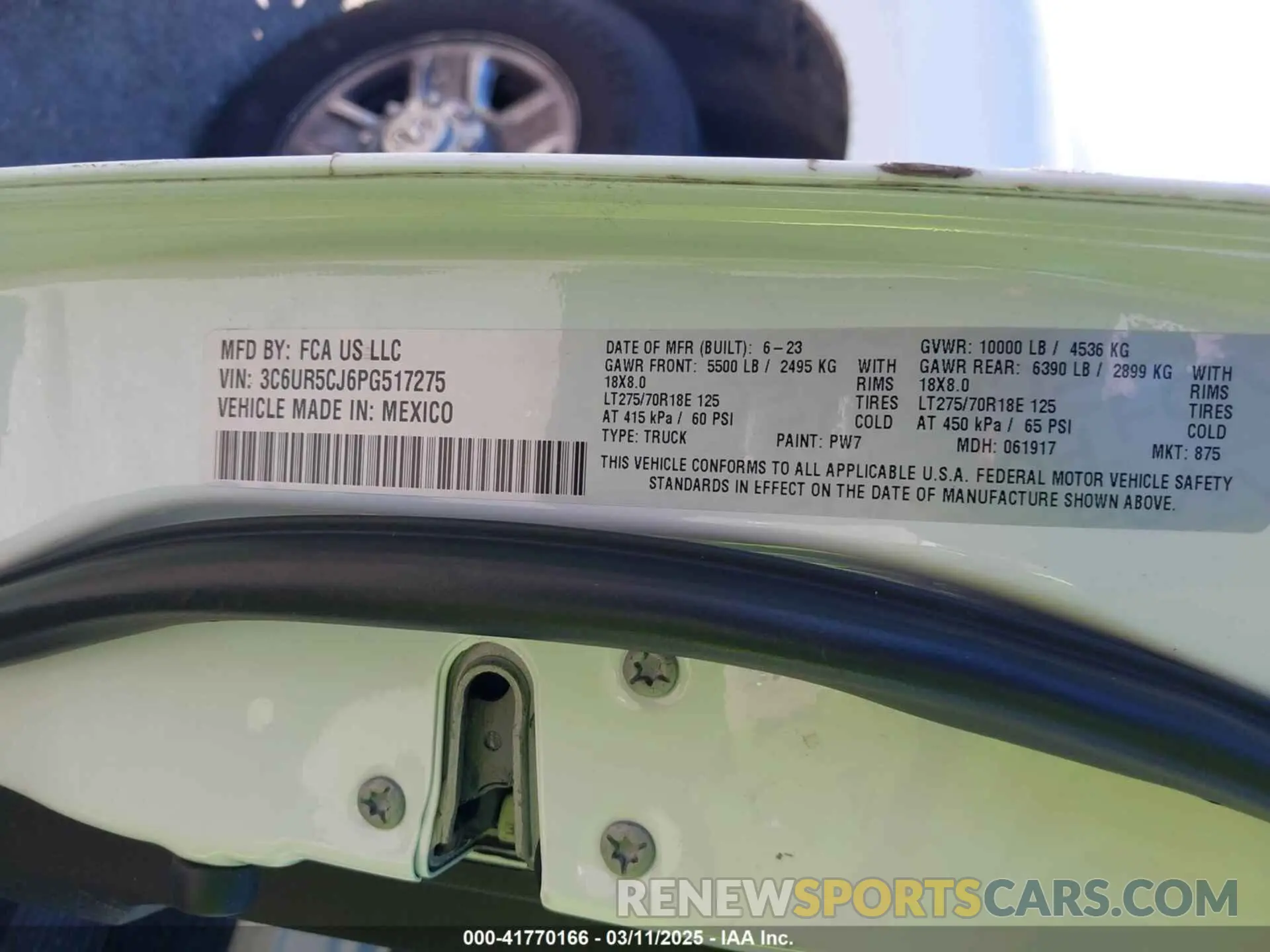 9 Photograph of a damaged car 3C6UR5CJ6PG517275 RAM 2500 2023