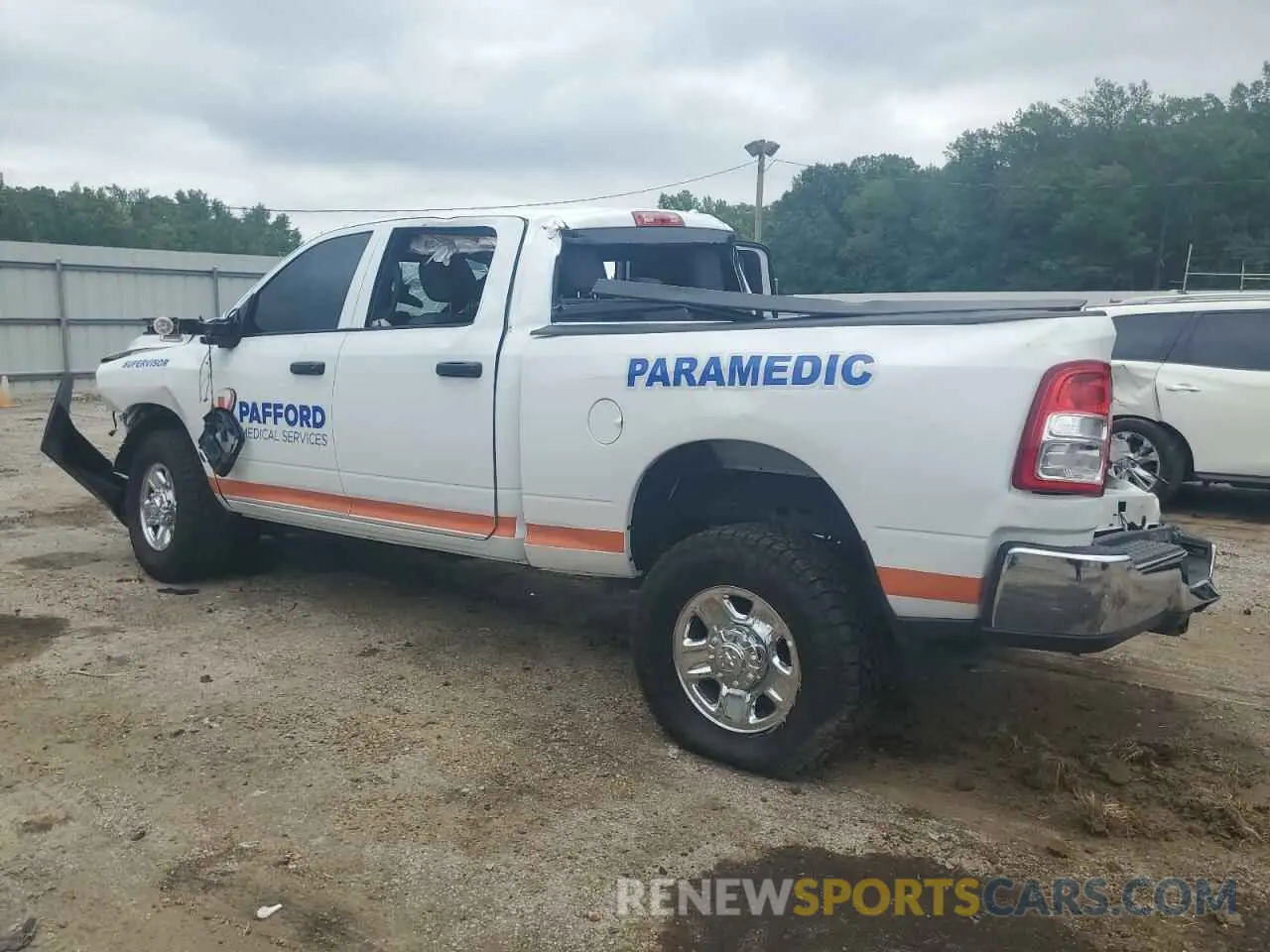 2 Photograph of a damaged car 3C6UR5CJ9PG614227 RAM 2500 2023