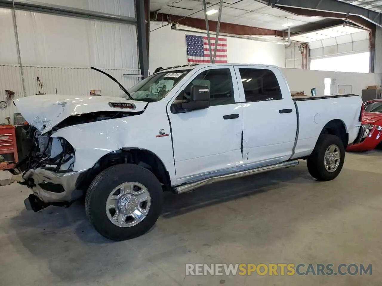 1 Photograph of a damaged car 3C6UR5CL0PG503647 RAM 2500 2023