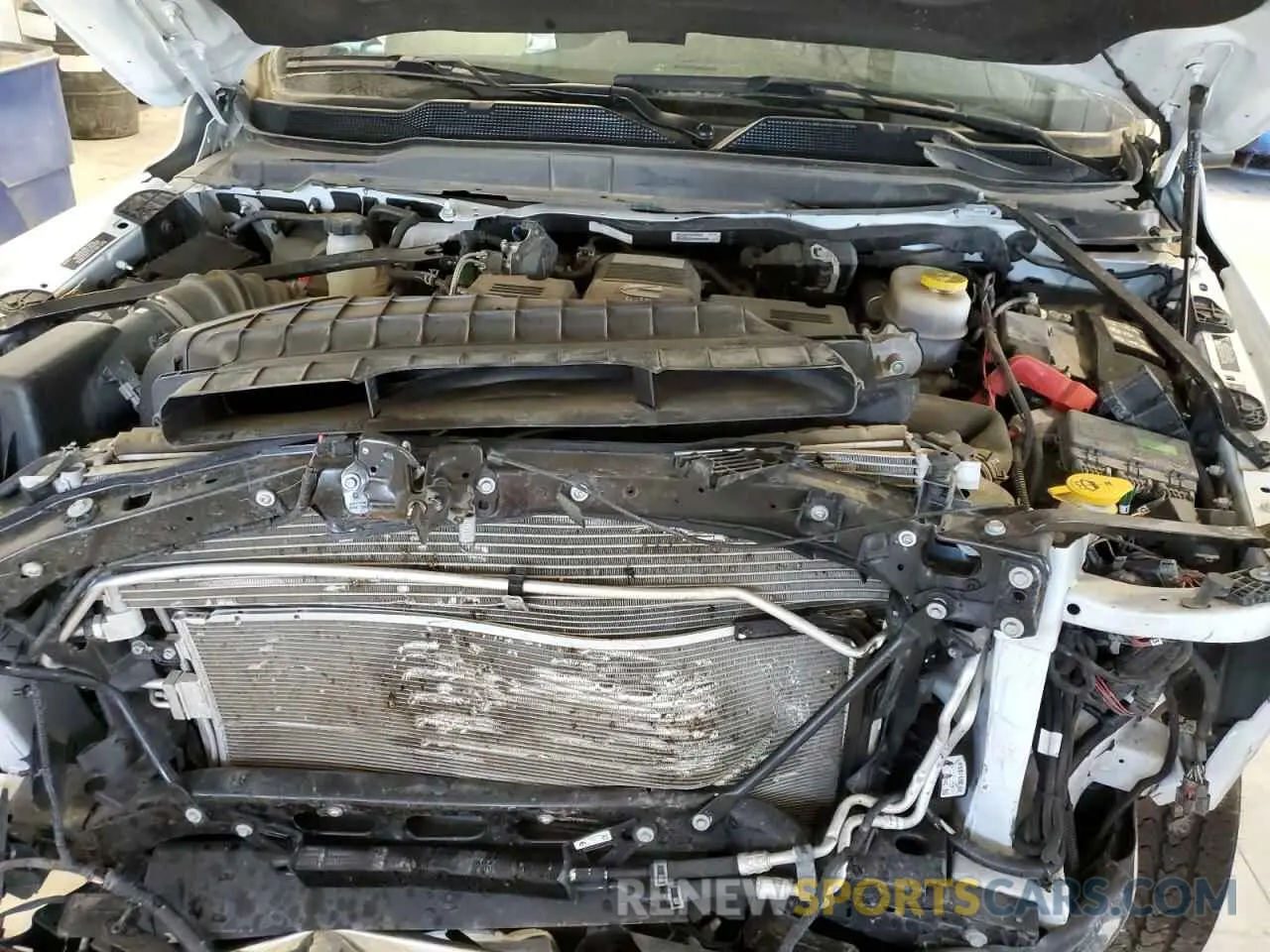 11 Photograph of a damaged car 3C6UR5CL0PG503647 RAM 2500 2023