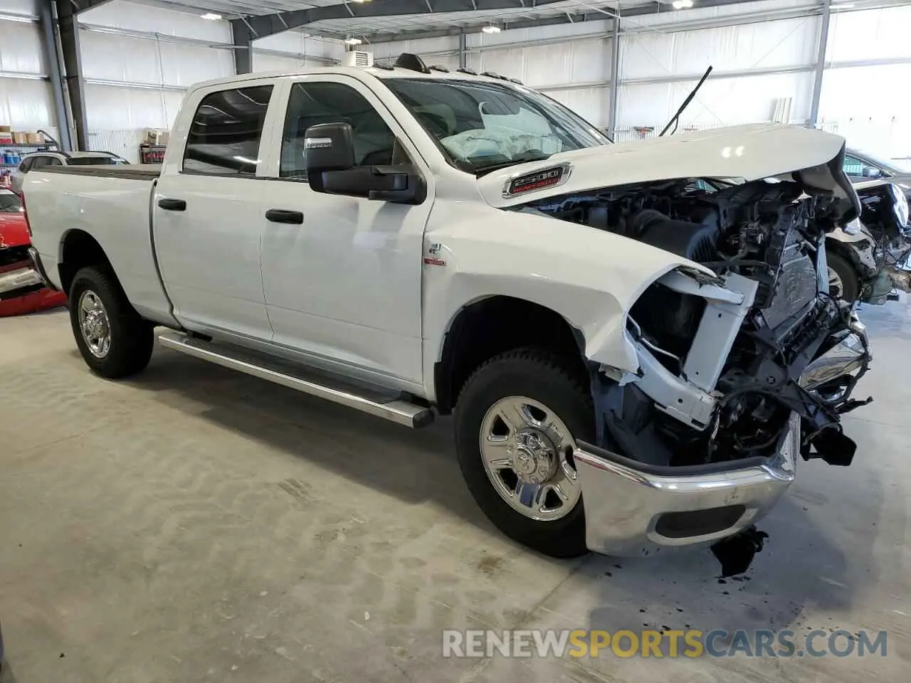 4 Photograph of a damaged car 3C6UR5CL0PG503647 RAM 2500 2023