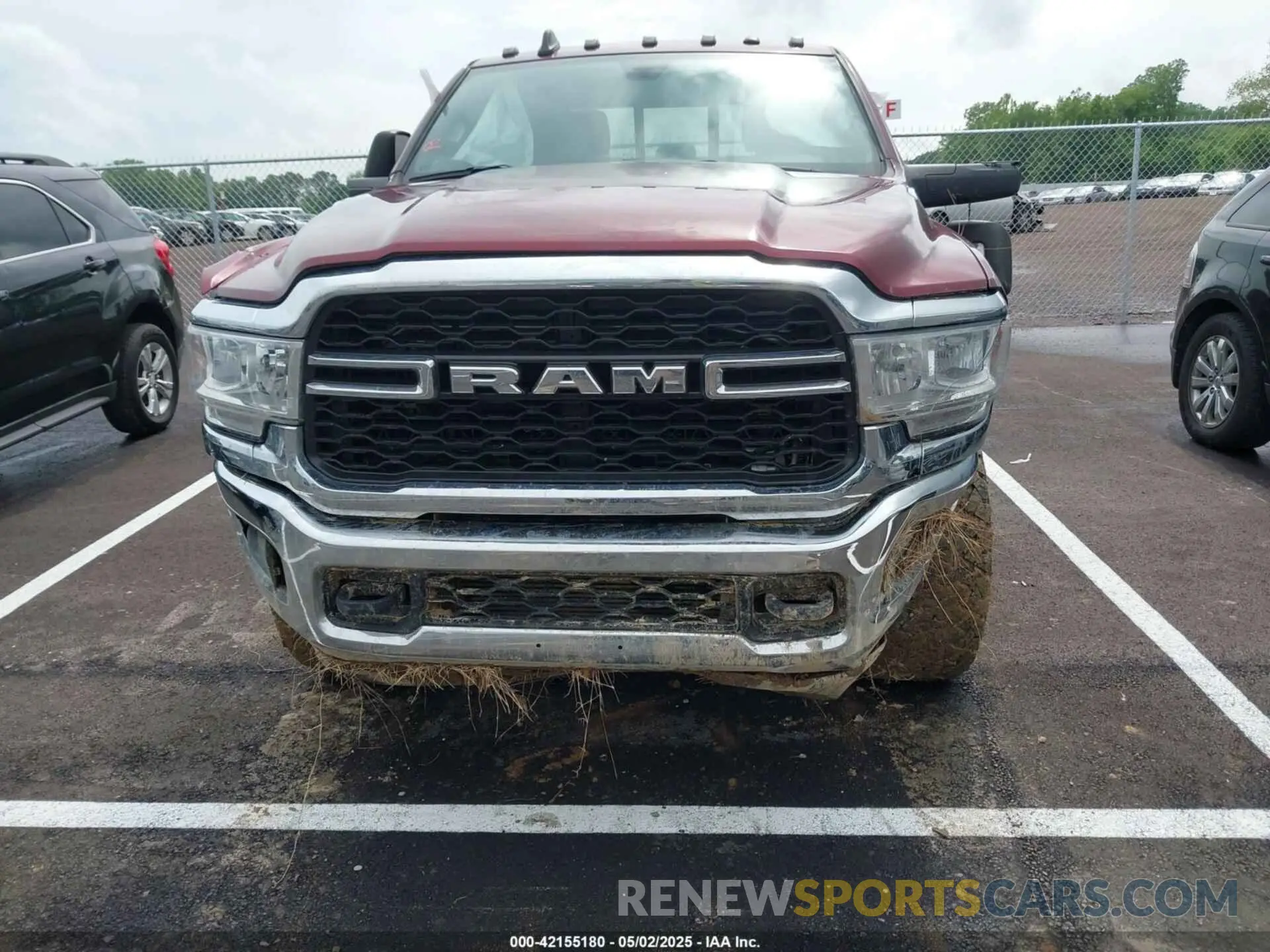 12 Photograph of a damaged car 3C6UR5CL3PG504534 RAM 2500 2023