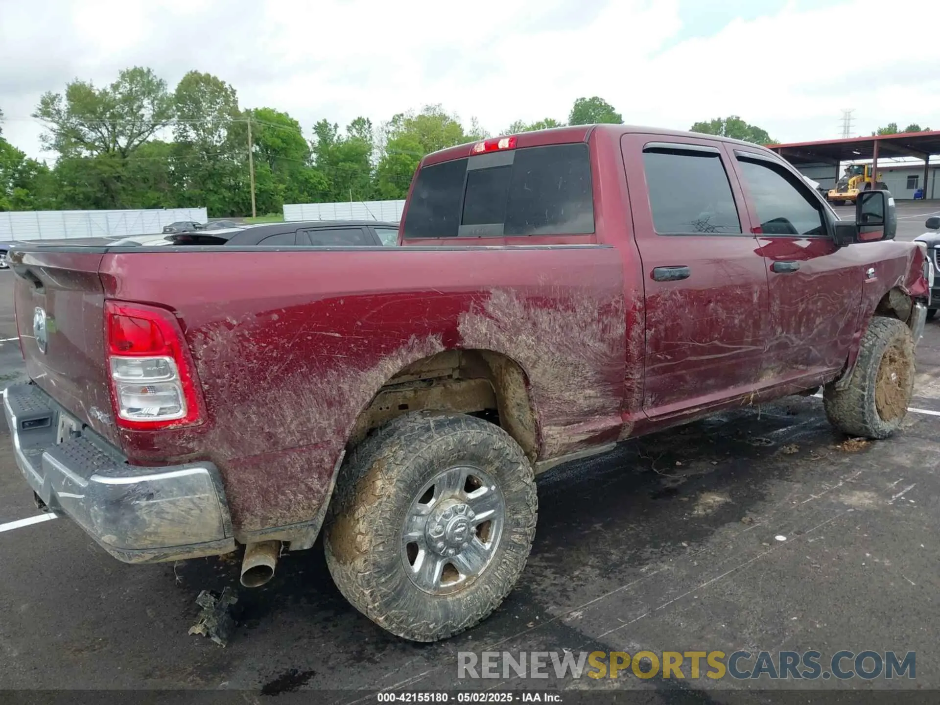 4 Photograph of a damaged car 3C6UR5CL3PG504534 RAM 2500 2023
