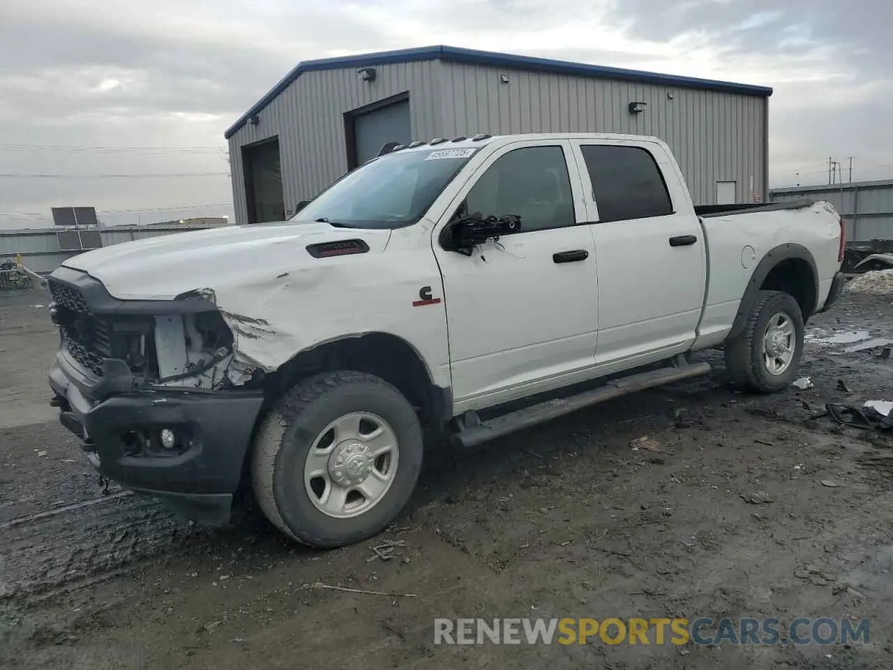 1 Photograph of a damaged car 3C6UR5CL3PG582280 RAM 2500 2023