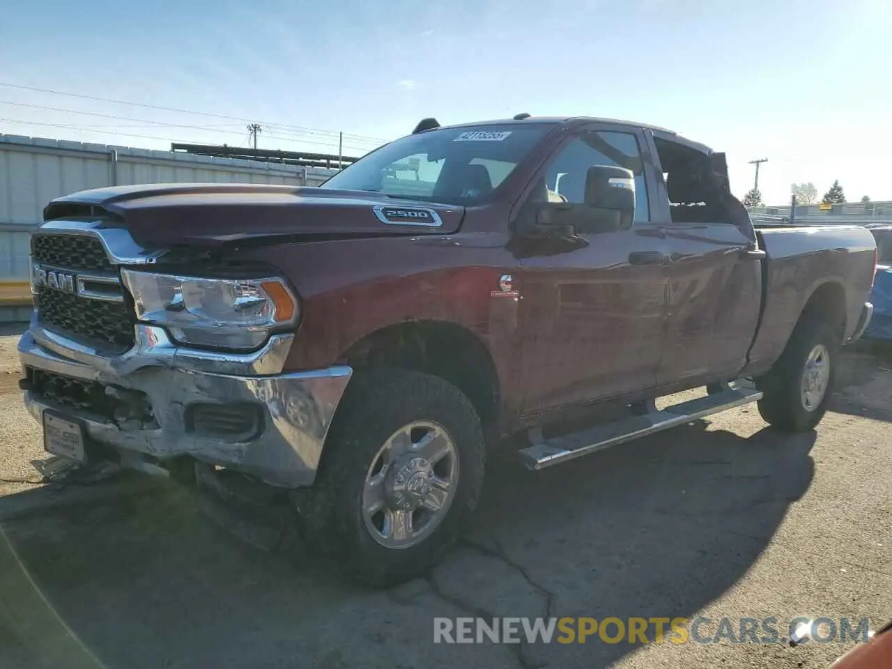 1 Photograph of a damaged car 3C6UR5CL4PG539521 RAM 2500 2023