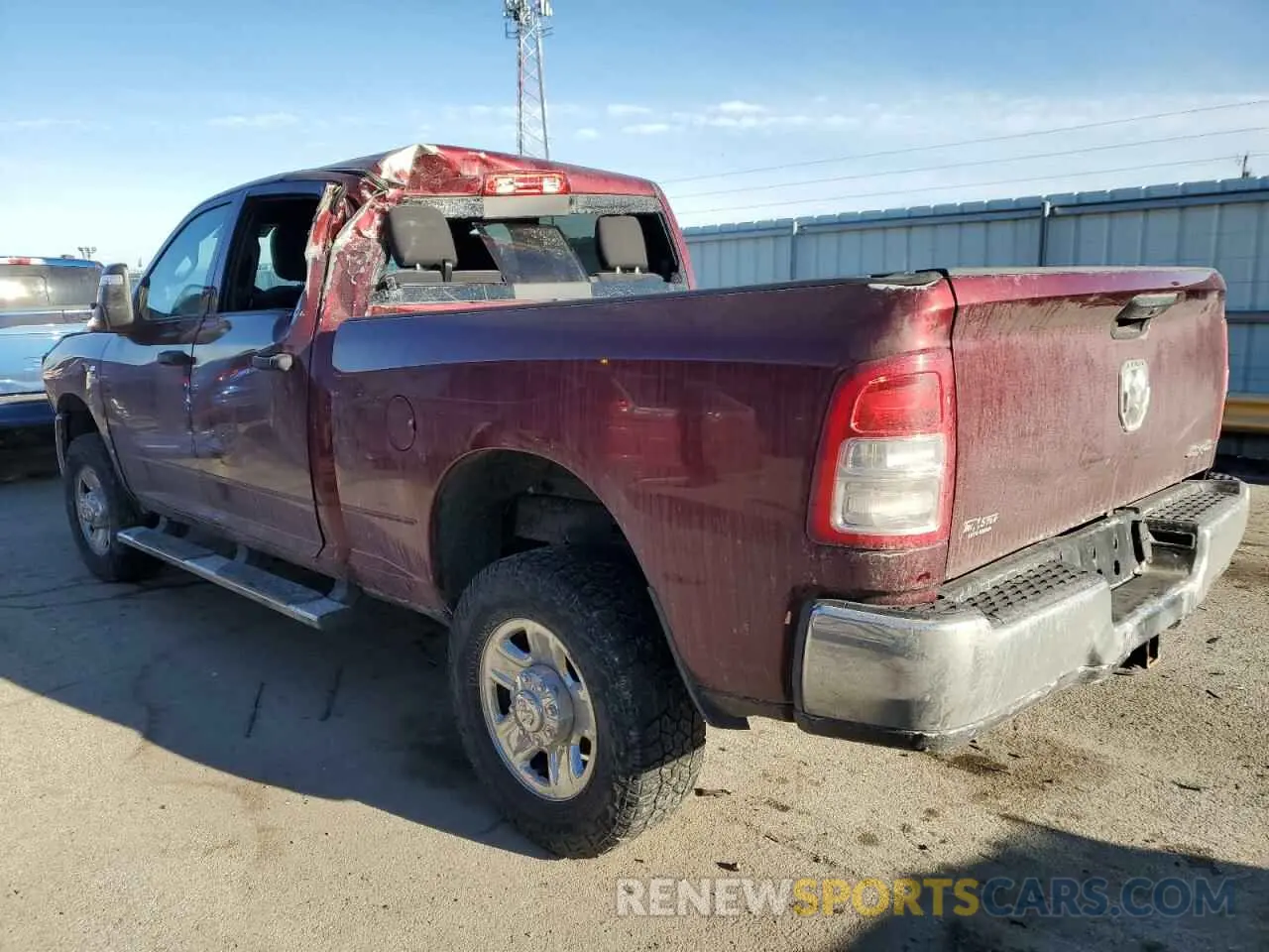 2 Photograph of a damaged car 3C6UR5CL4PG539521 RAM 2500 2023