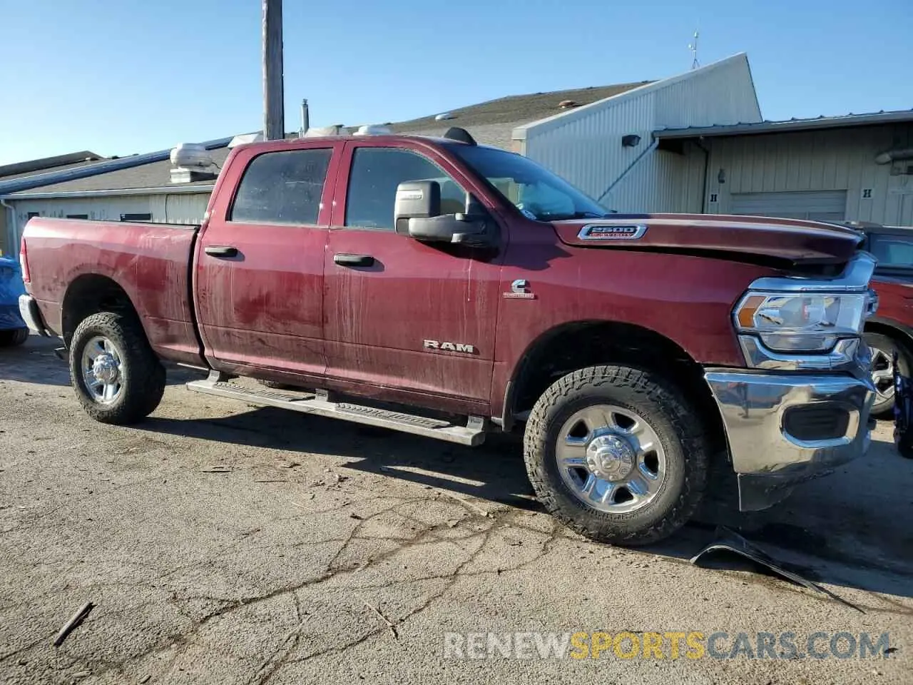 4 Photograph of a damaged car 3C6UR5CL4PG539521 RAM 2500 2023