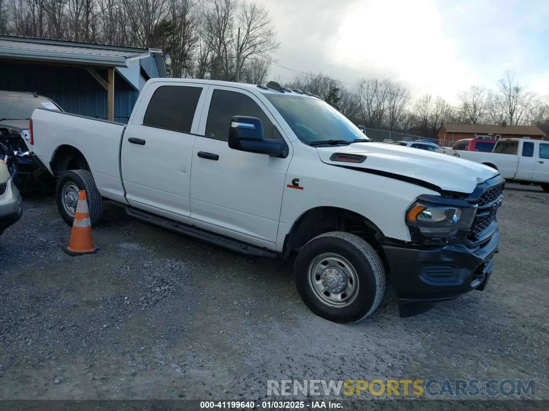 1 Photograph of a damaged car 3C6UR5CL5PG517155 RAM 2500 2023