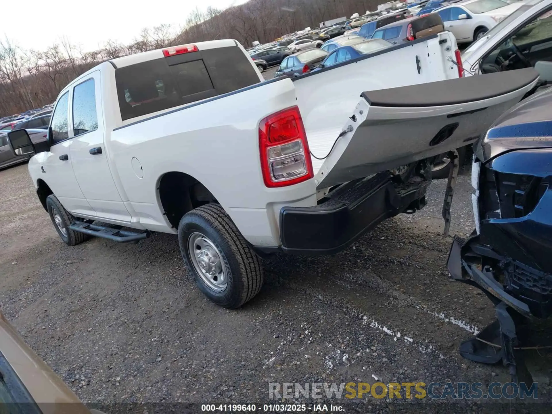3 Photograph of a damaged car 3C6UR5CL5PG517155 RAM 2500 2023