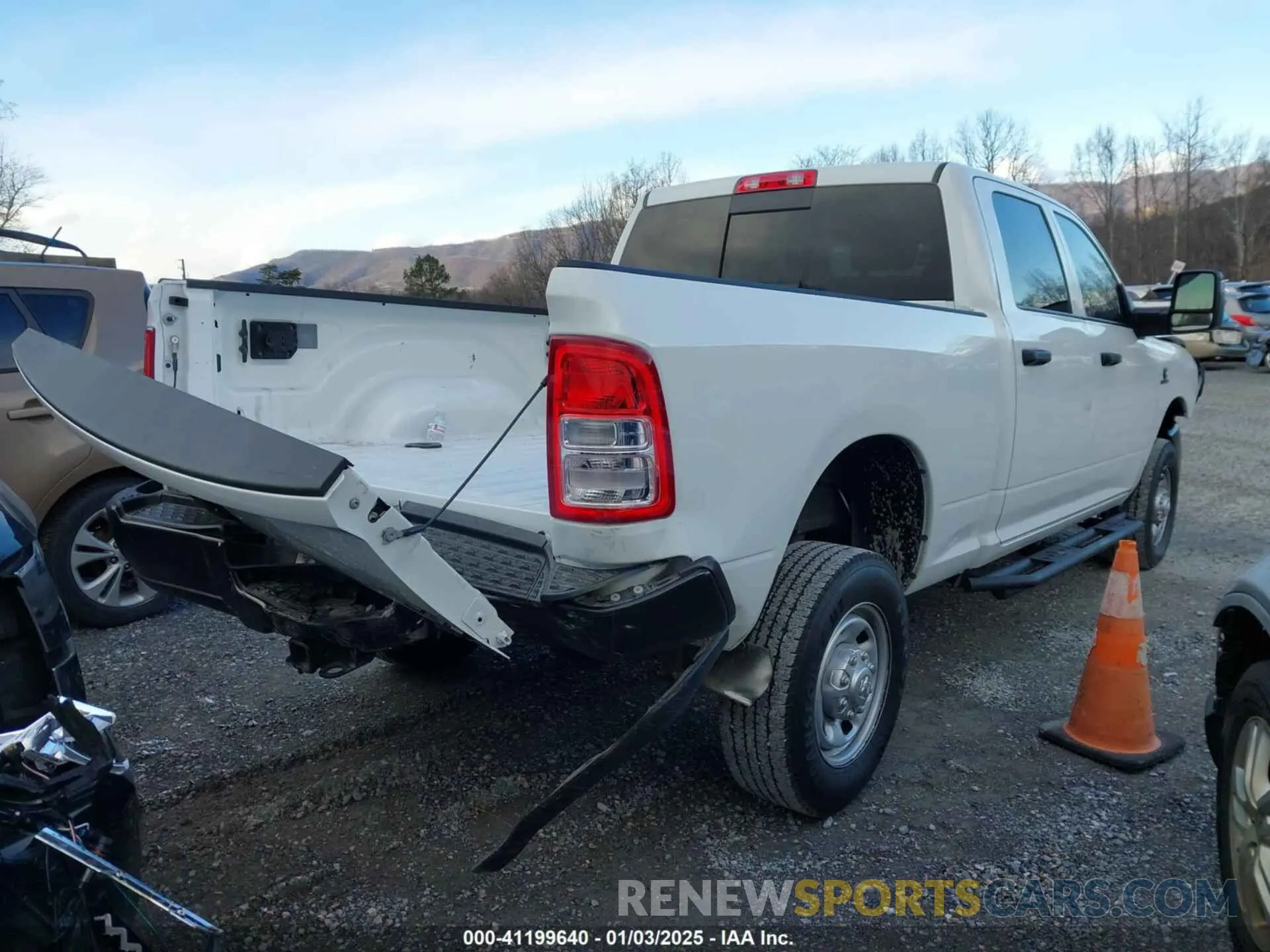 6 Photograph of a damaged car 3C6UR5CL5PG517155 RAM 2500 2023