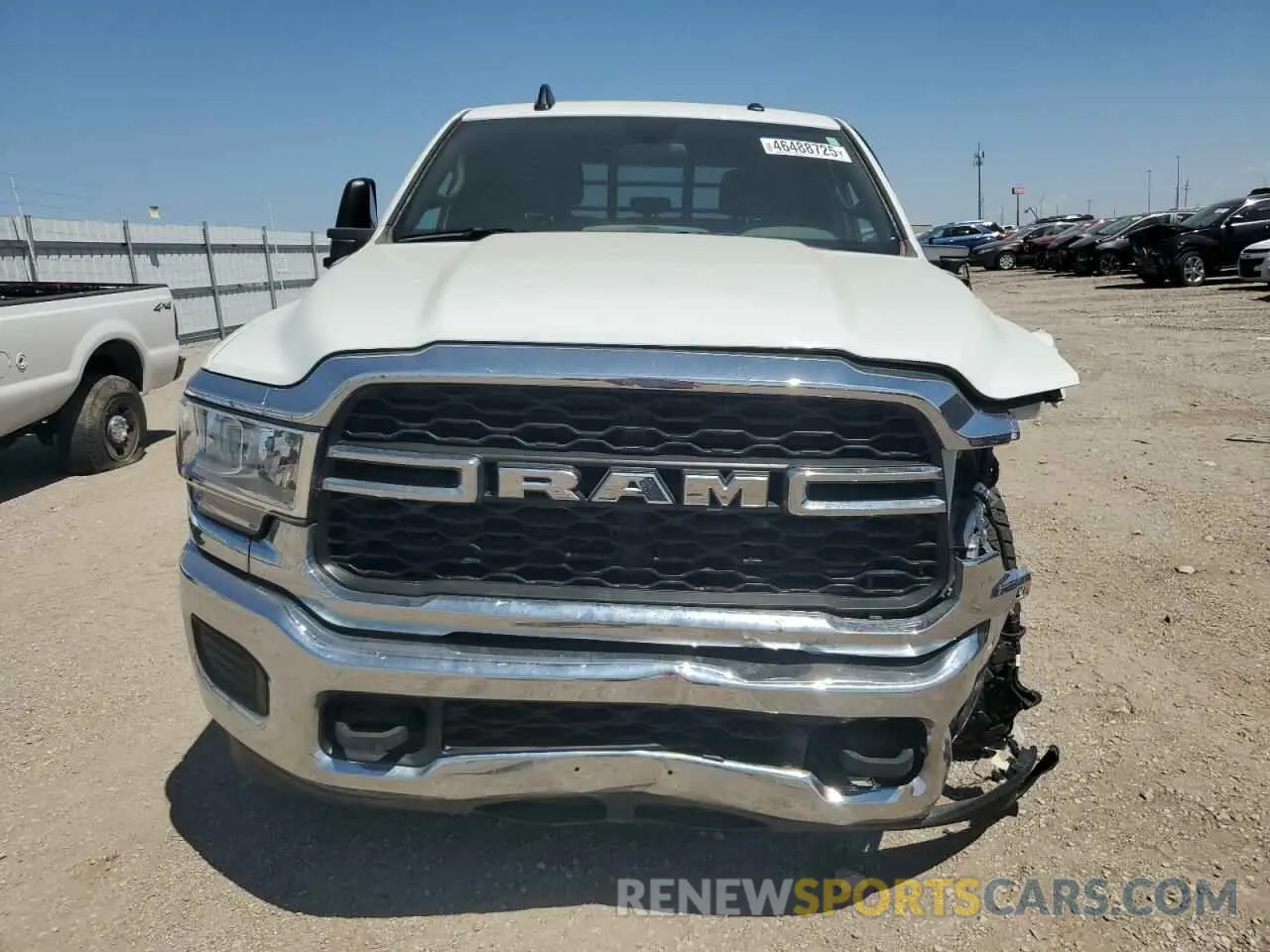 5 Photograph of a damaged car 3C6UR5CL7PG538704 RAM 2500 2023