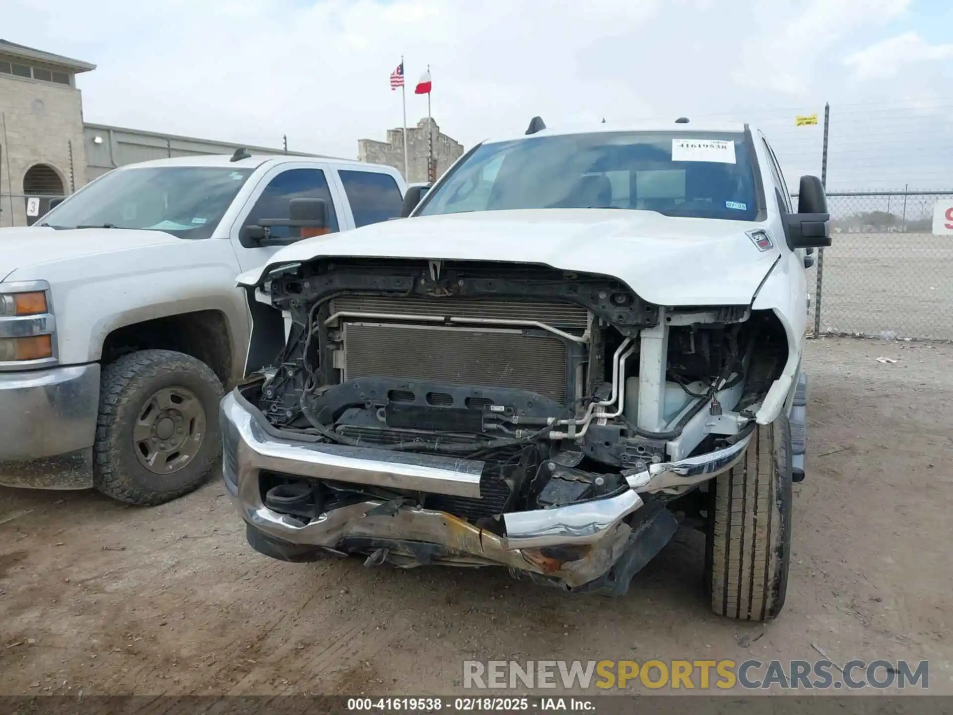 13 Photograph of a damaged car 3C6UR5CL7PG566941 RAM 2500 2023