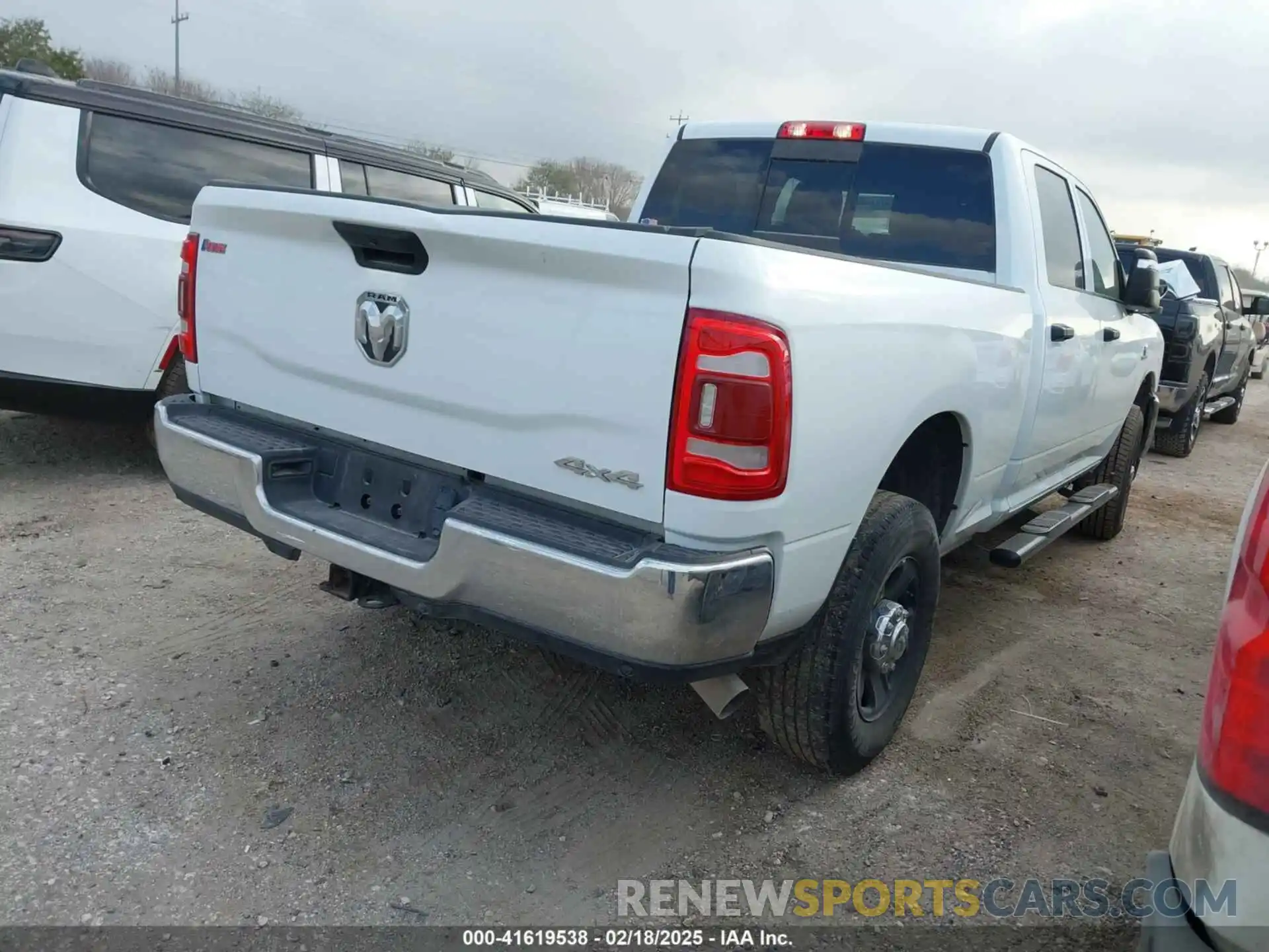 4 Photograph of a damaged car 3C6UR5CL7PG566941 RAM 2500 2023