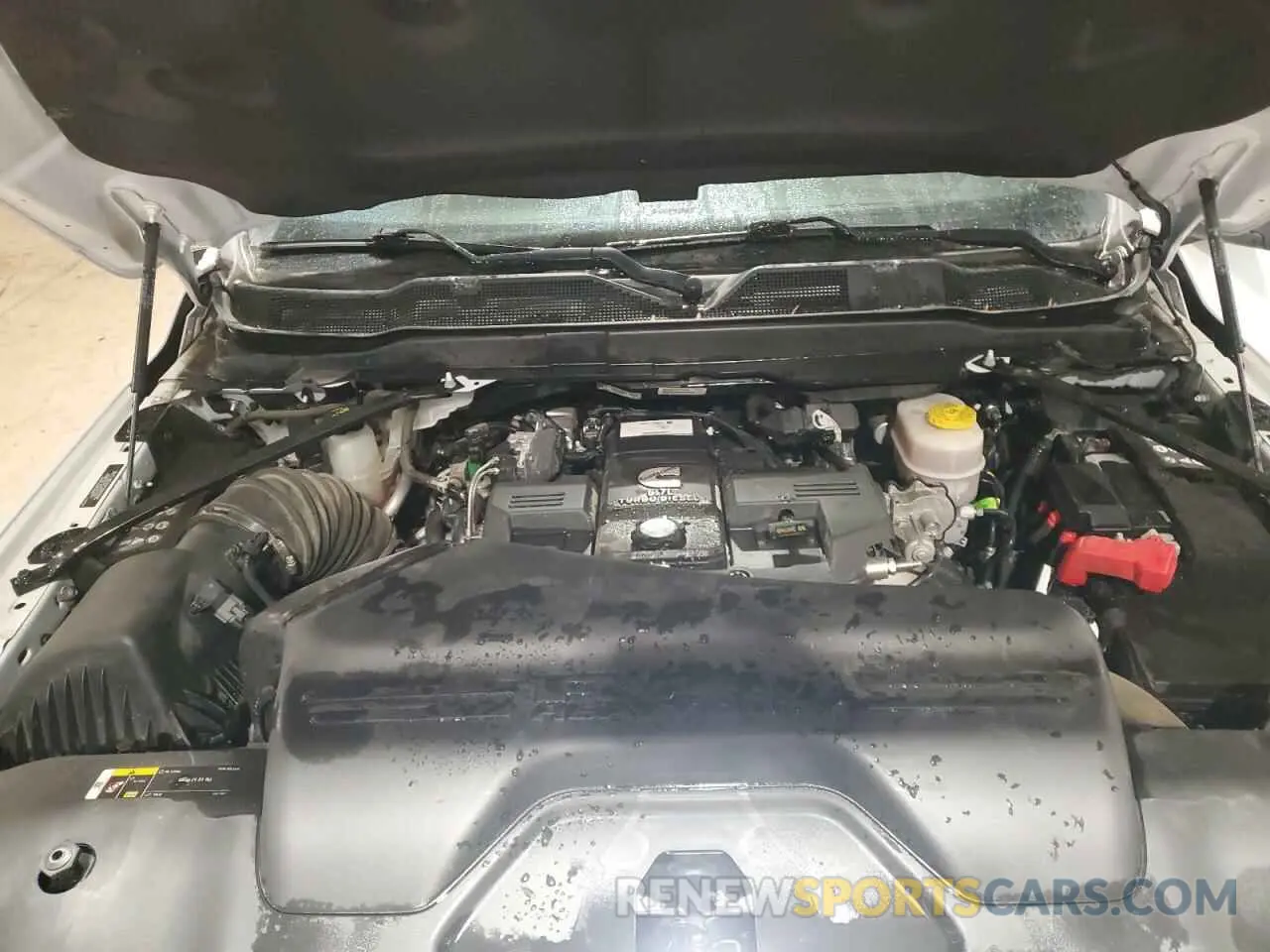 11 Photograph of a damaged car 3C6UR5CLXPG500318 RAM 2500 2023