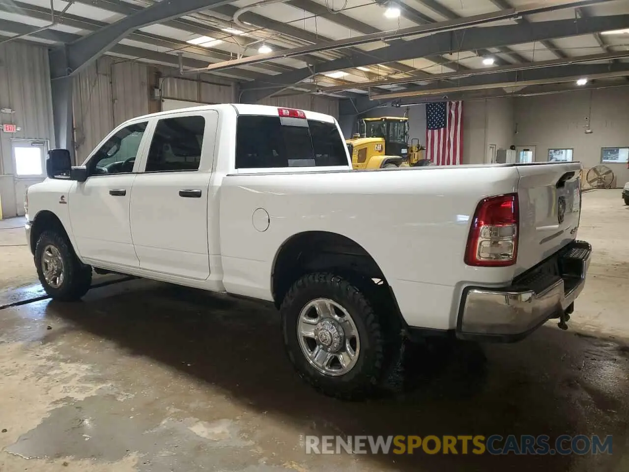 2 Photograph of a damaged car 3C6UR5CLXPG500318 RAM 2500 2023
