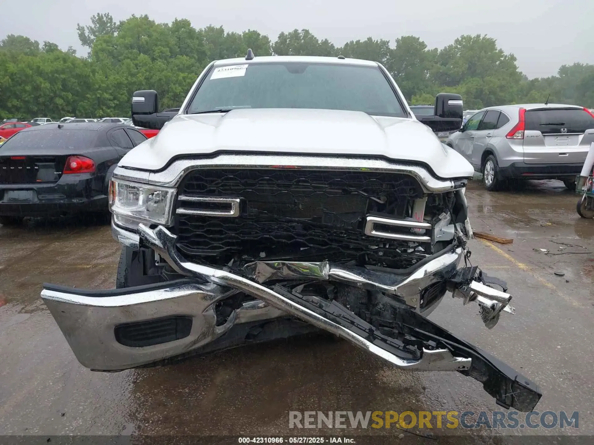 13 Photograph of a damaged car 3C6UR5CLXPG617834 RAM 2500 2023