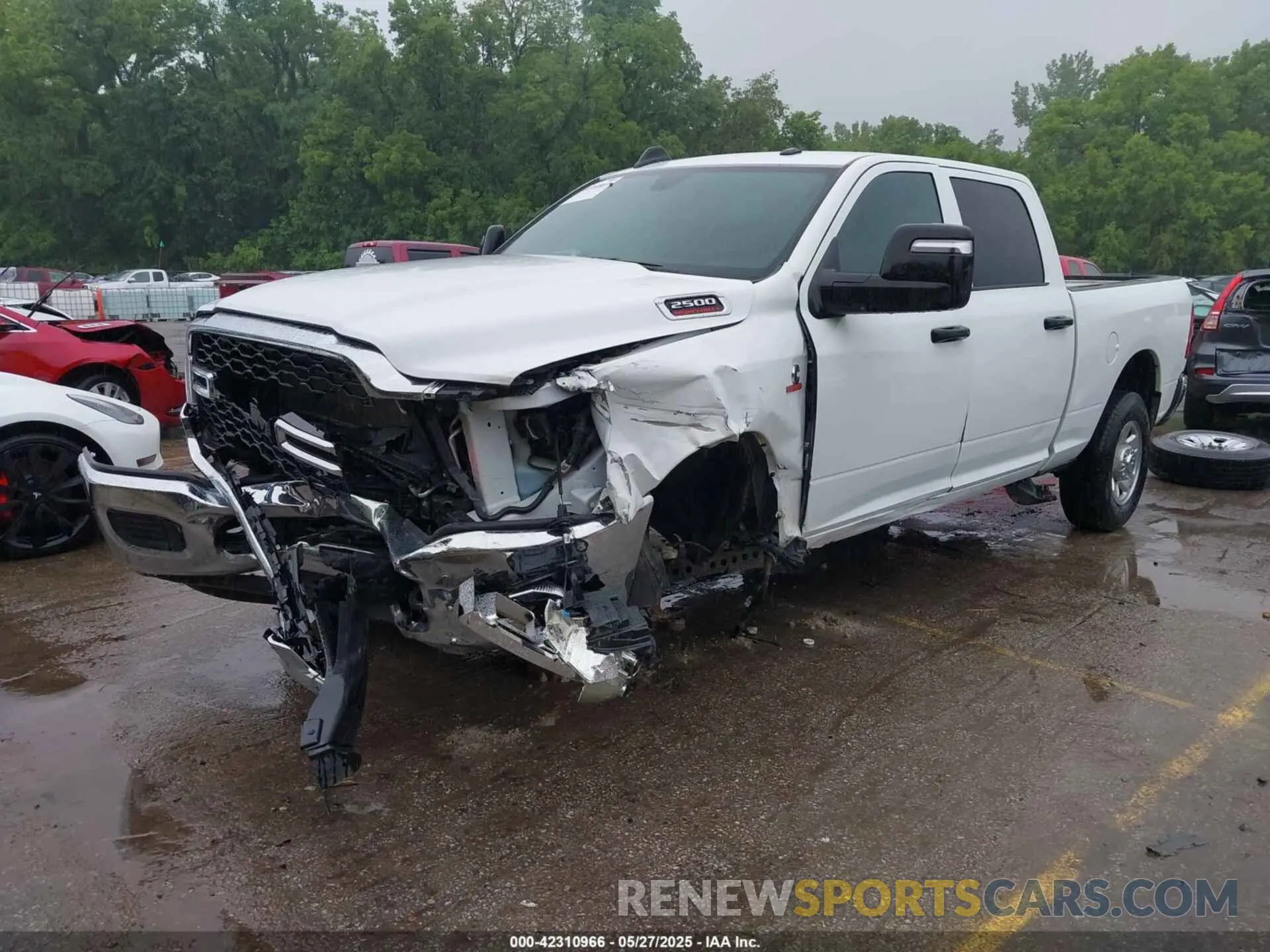 2 Photograph of a damaged car 3C6UR5CLXPG617834 RAM 2500 2023