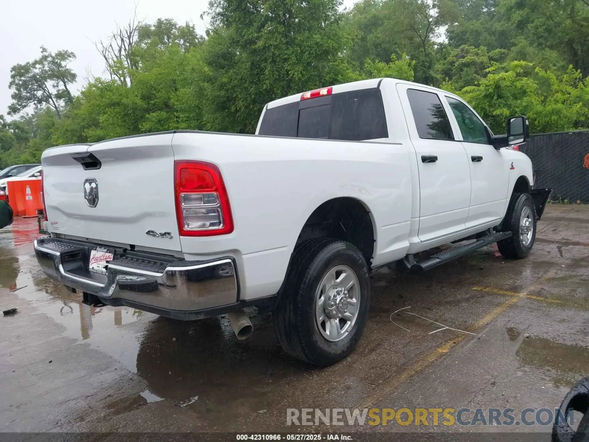 4 Photograph of a damaged car 3C6UR5CLXPG617834 RAM 2500 2023