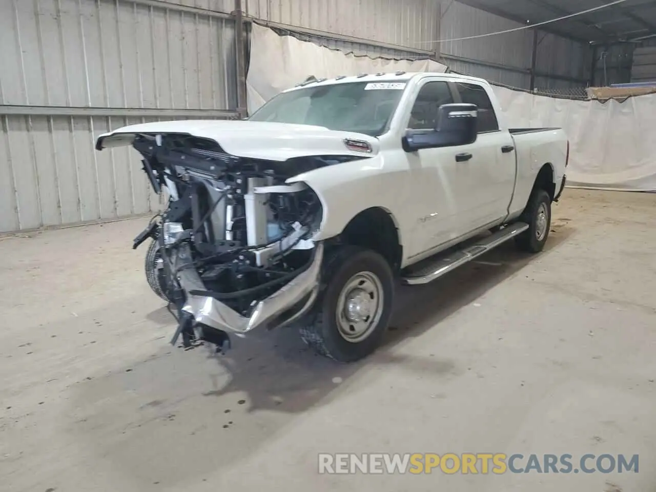 1 Photograph of a damaged car 3C6UR5DJ1PG542986 RAM 2500 2023