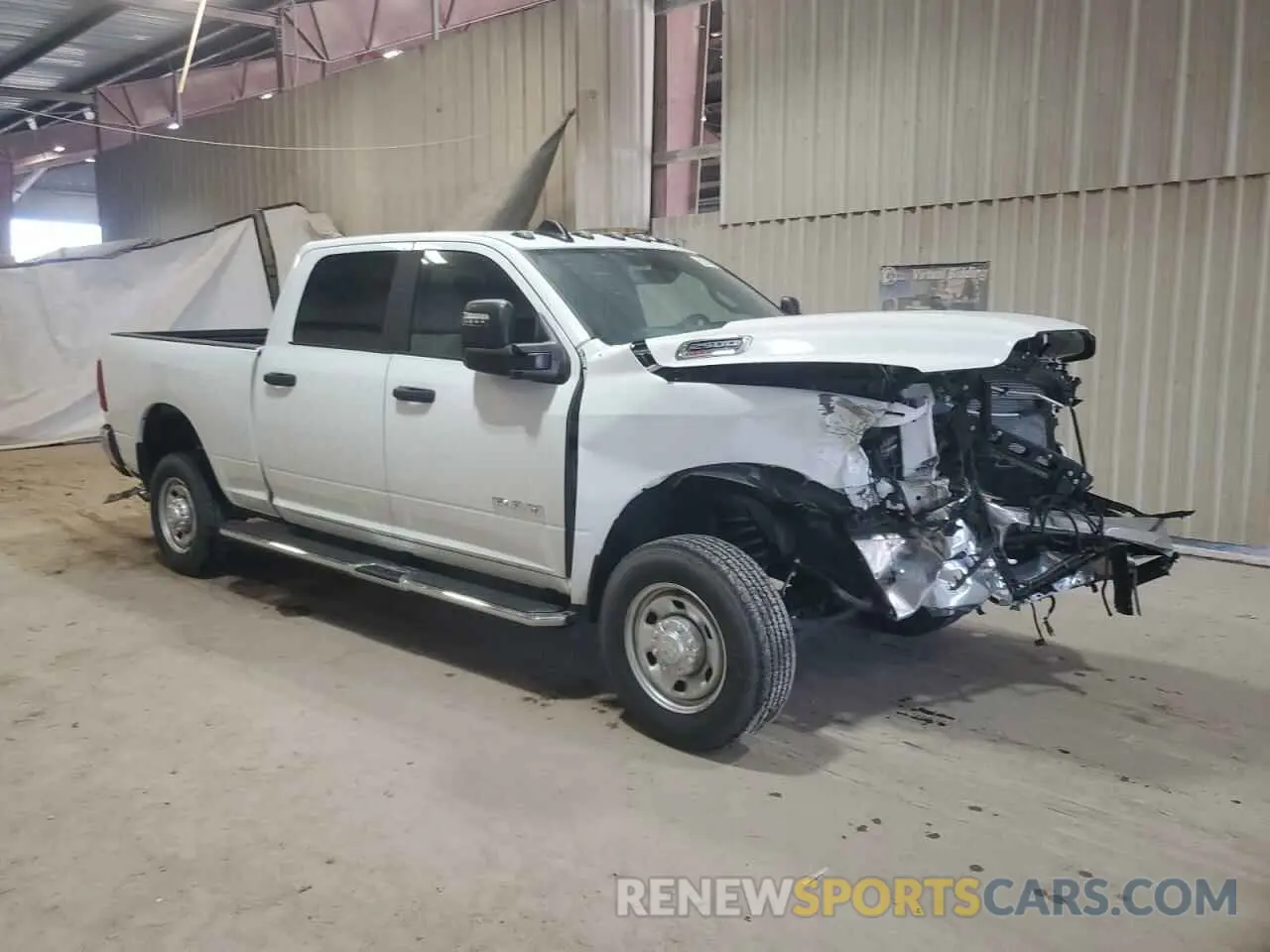 4 Photograph of a damaged car 3C6UR5DJ1PG542986 RAM 2500 2023