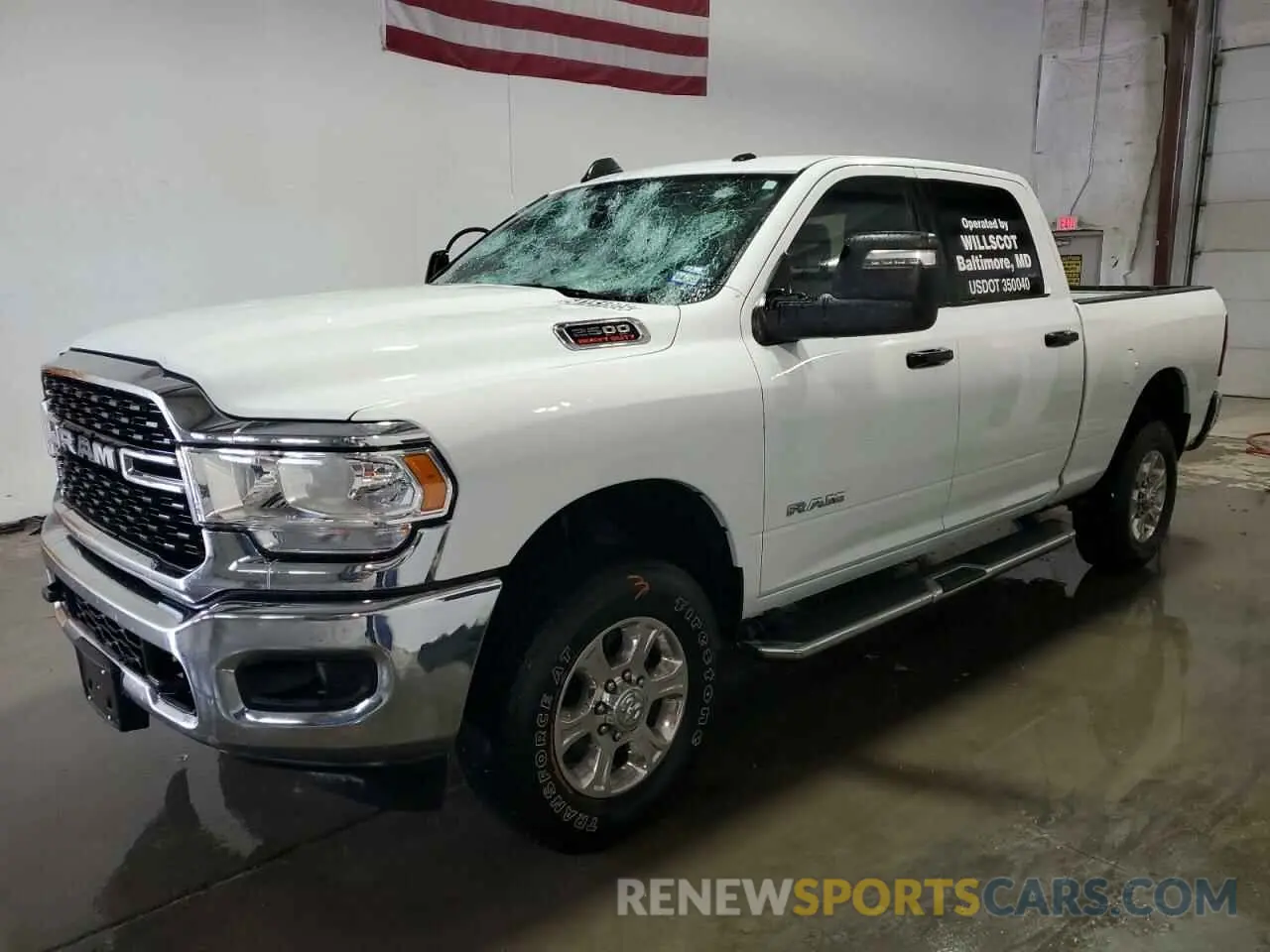 1 Photograph of a damaged car 3C6UR5DJ4PG610858 RAM 2500 2023