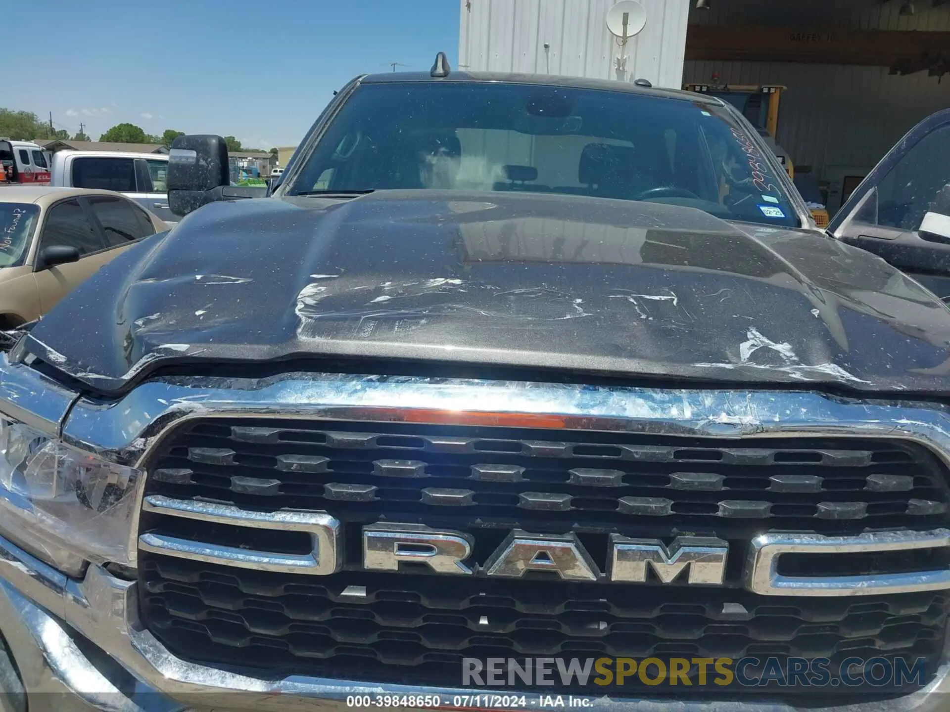 10 Photograph of a damaged car 3C6UR5DJ5PG548743 RAM 2500 2023