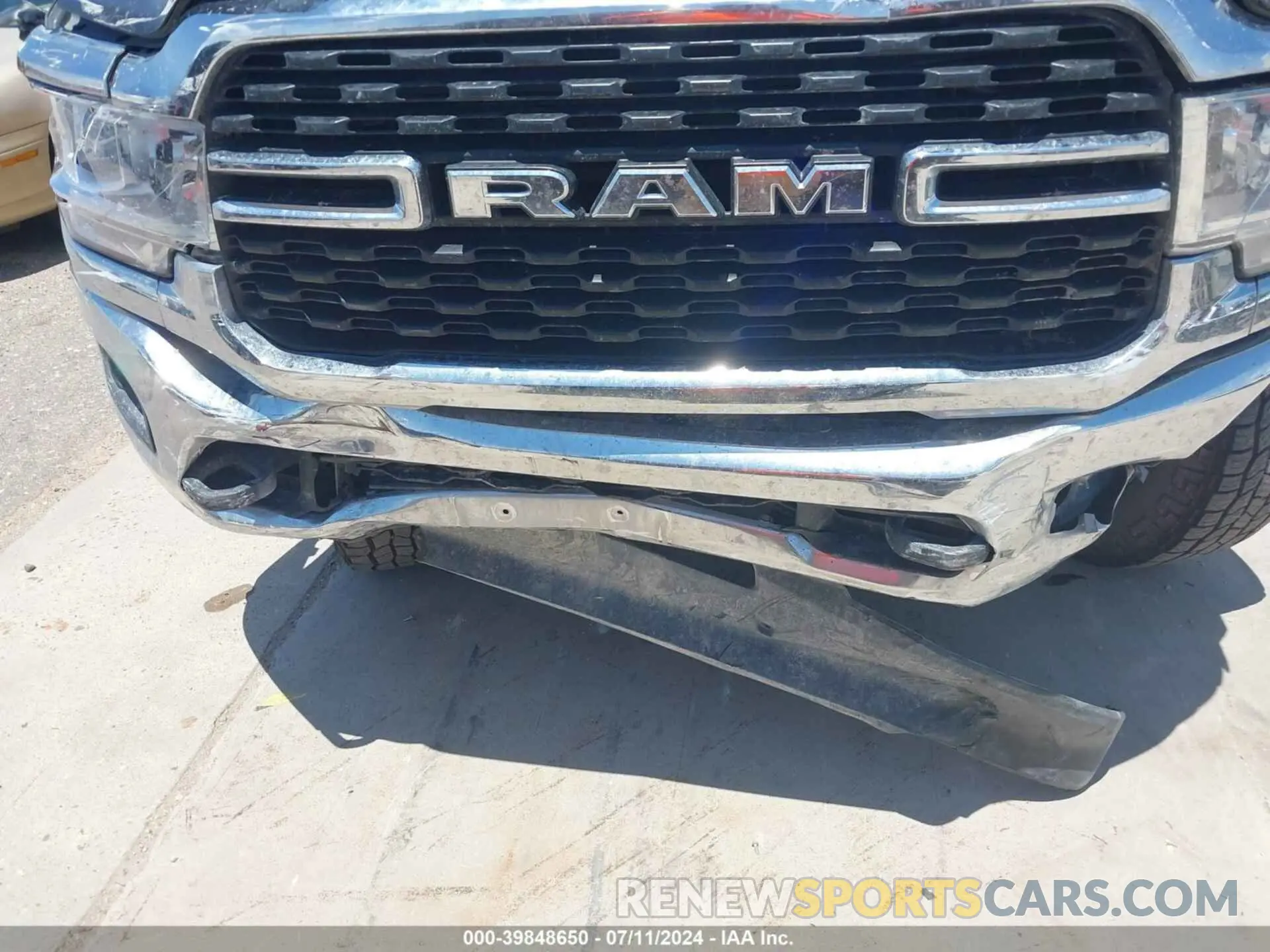 6 Photograph of a damaged car 3C6UR5DJ5PG548743 RAM 2500 2023