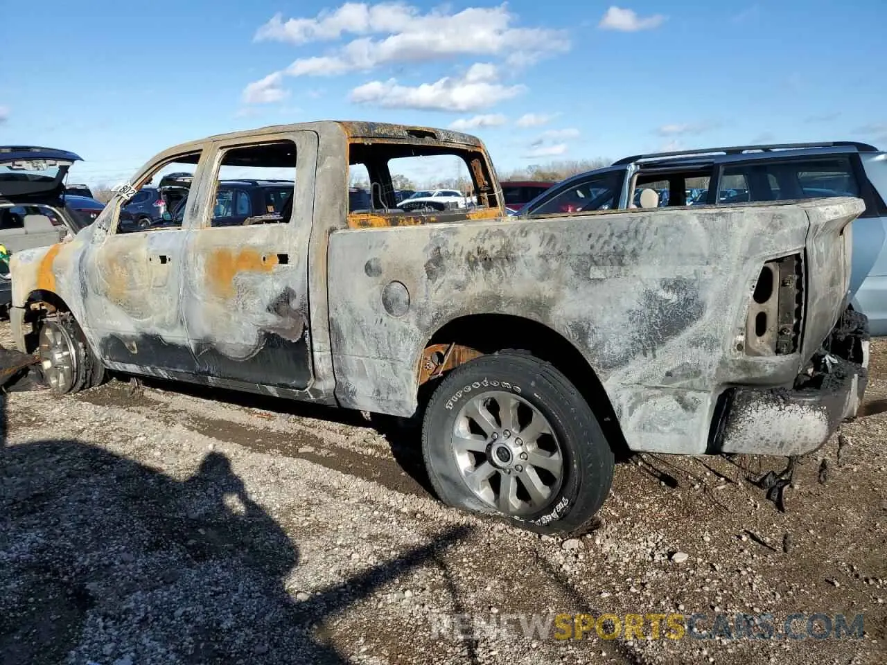 2 Photograph of a damaged car 3C6UR5DJ6PG591827 RAM 2500 2023