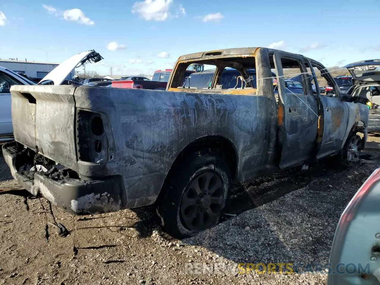 3 Photograph of a damaged car 3C6UR5DJ6PG591827 RAM 2500 2023