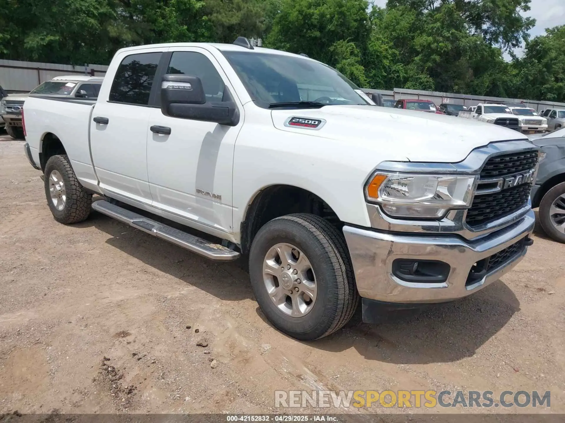 1 Photograph of a damaged car 3C6UR5DJXPG632878 RAM 2500 2023