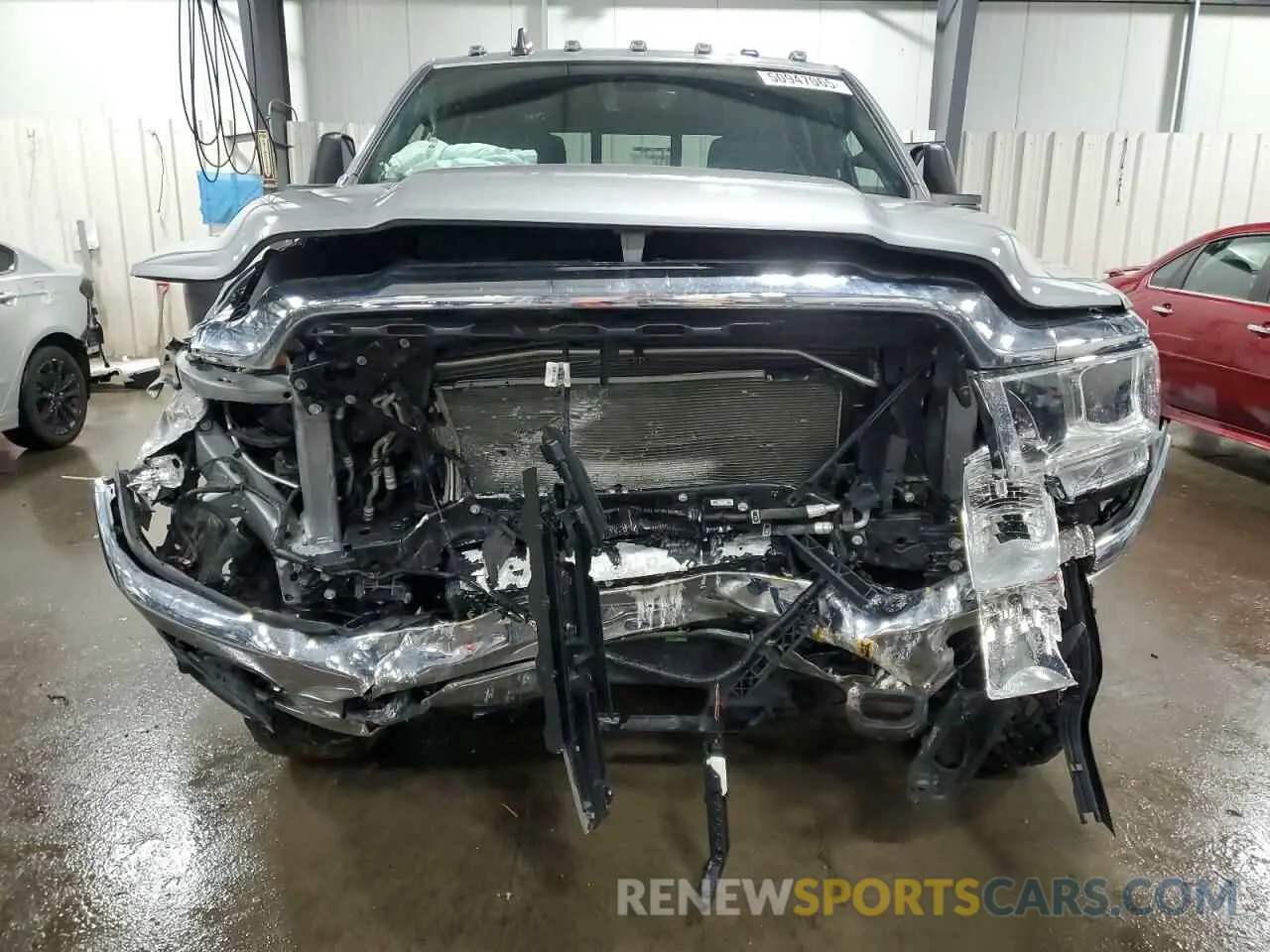 5 Photograph of a damaged car 3C6UR5DL0PG547212 RAM 2500 2023