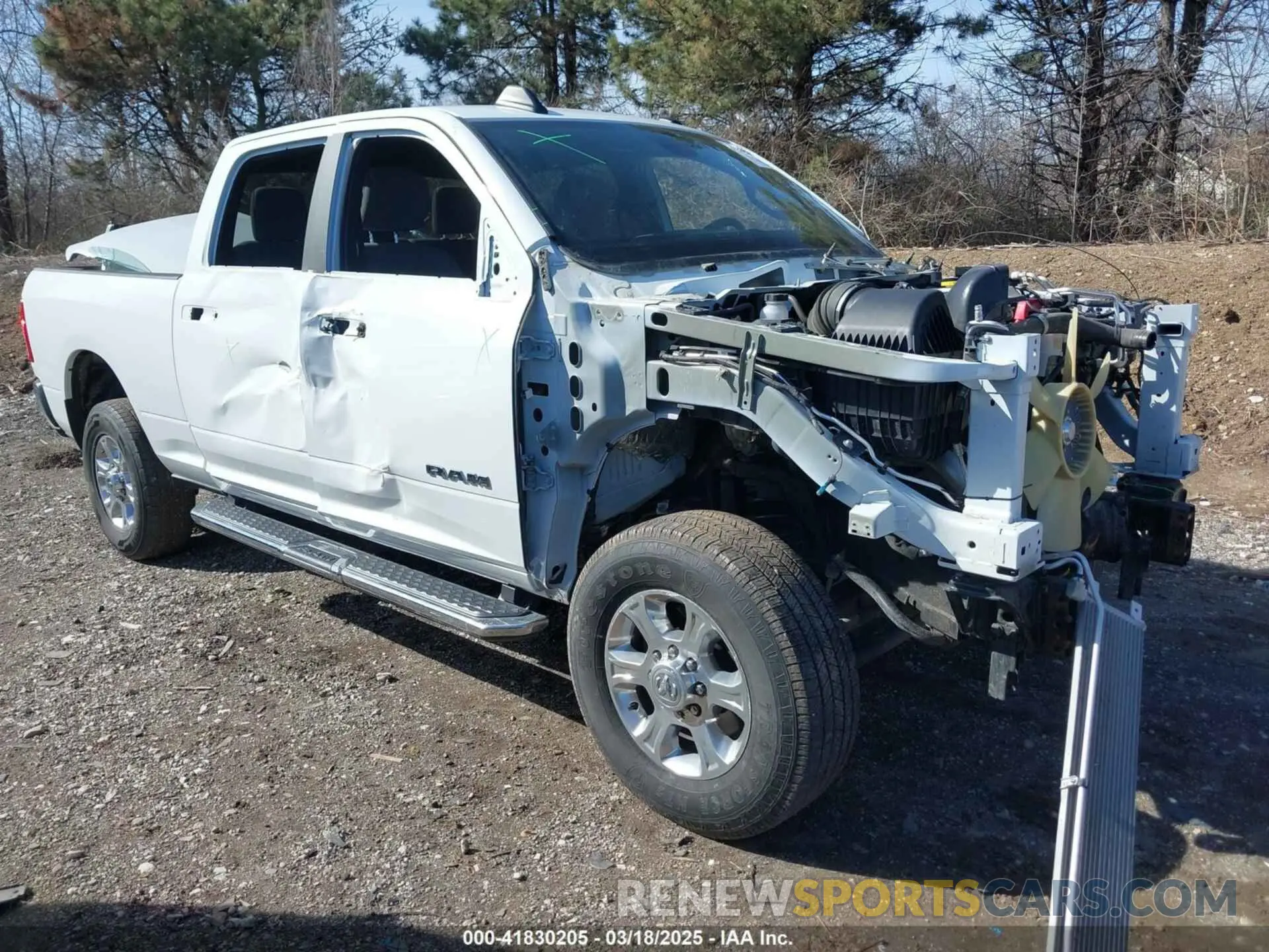 1 Photograph of a damaged car 3C6UR5DL0PG611149 RAM 2500 2023